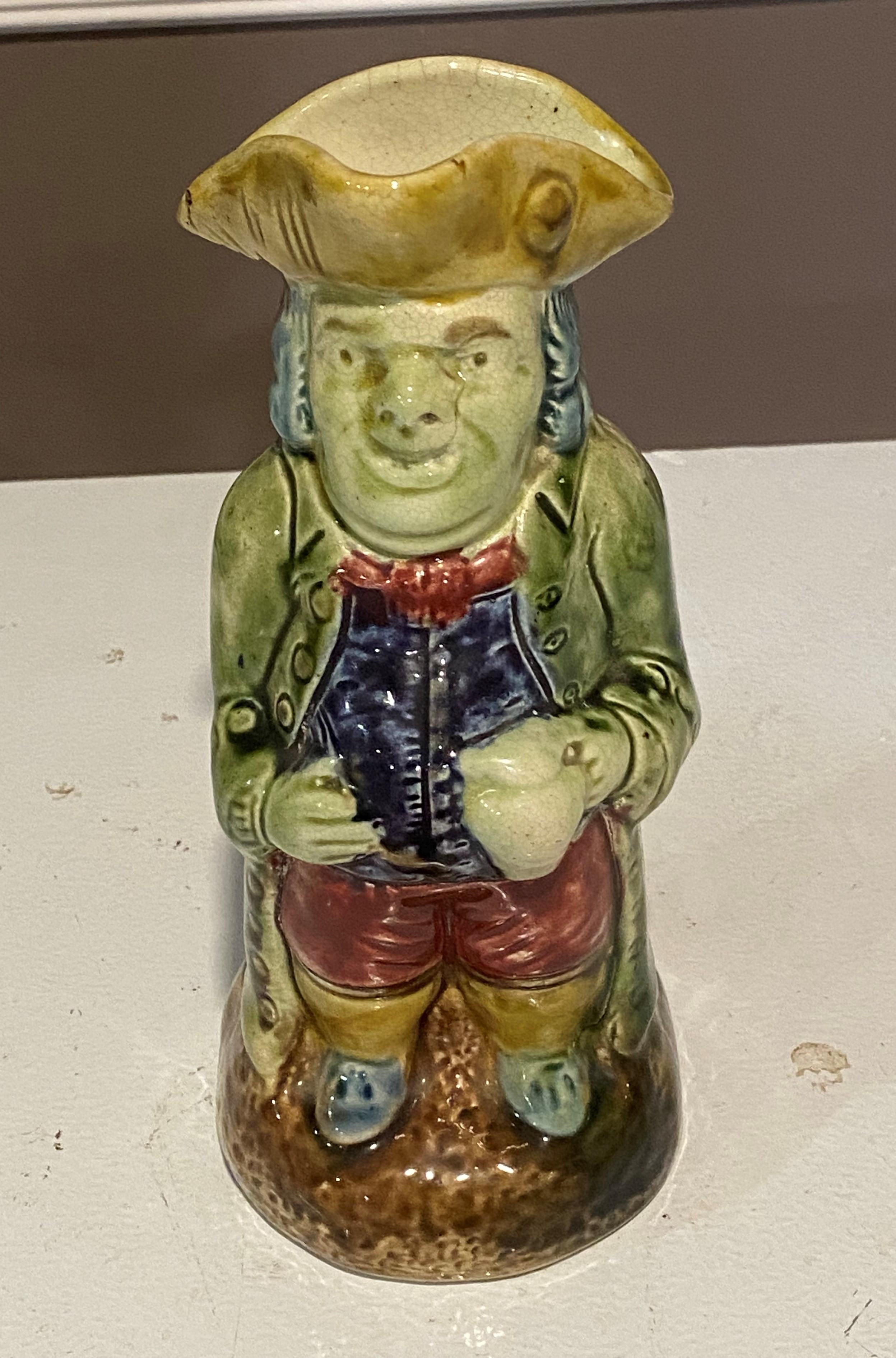 Good pearlware toby jug, Provenance Eli Kaplan Antques, NYC and Christies, NY. I se no damage or repair.