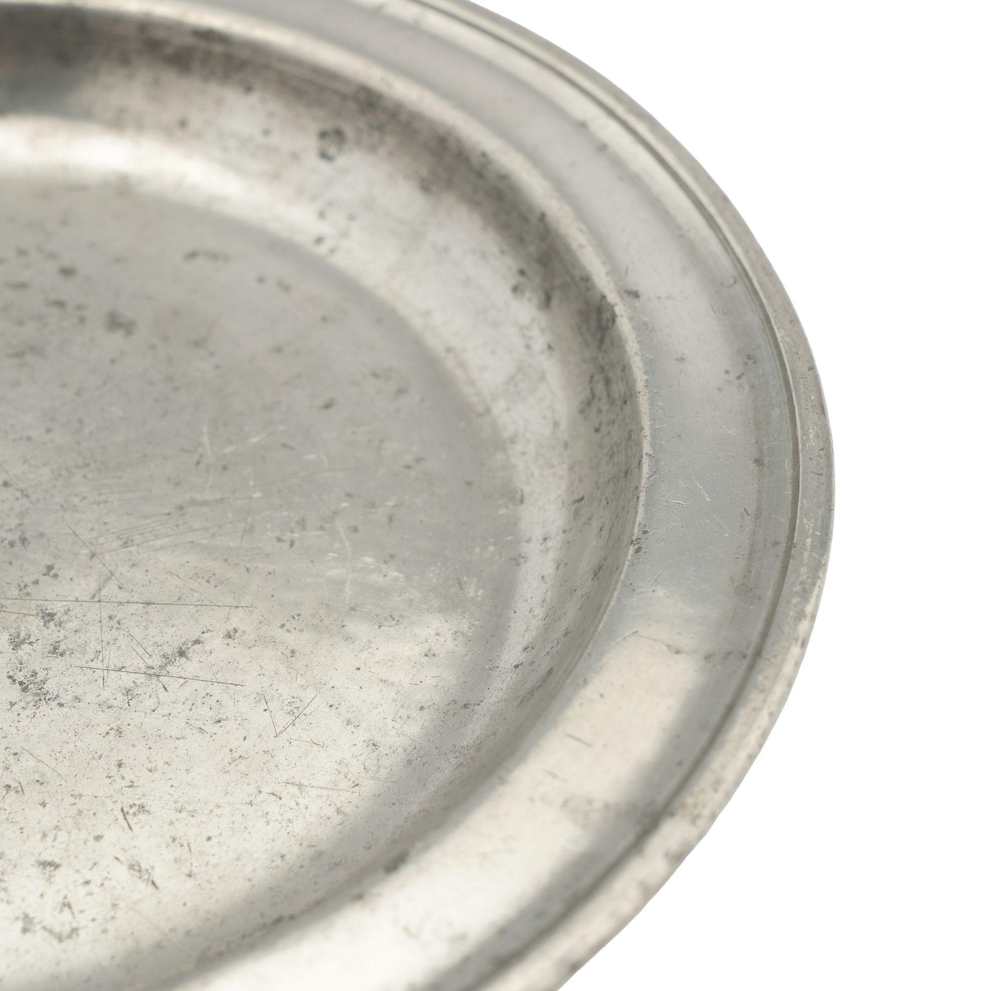 18th Century English pewter plate with beaded rim and touch mark on the reverse, 1700's