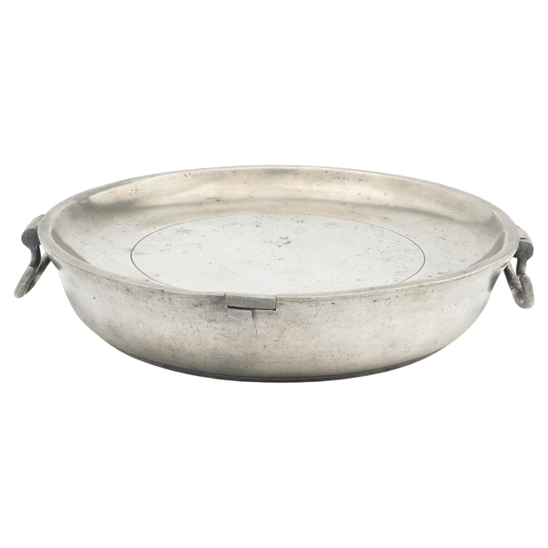 English pewter warming plate with drop handles by V&W Birmingham, 1808-1827