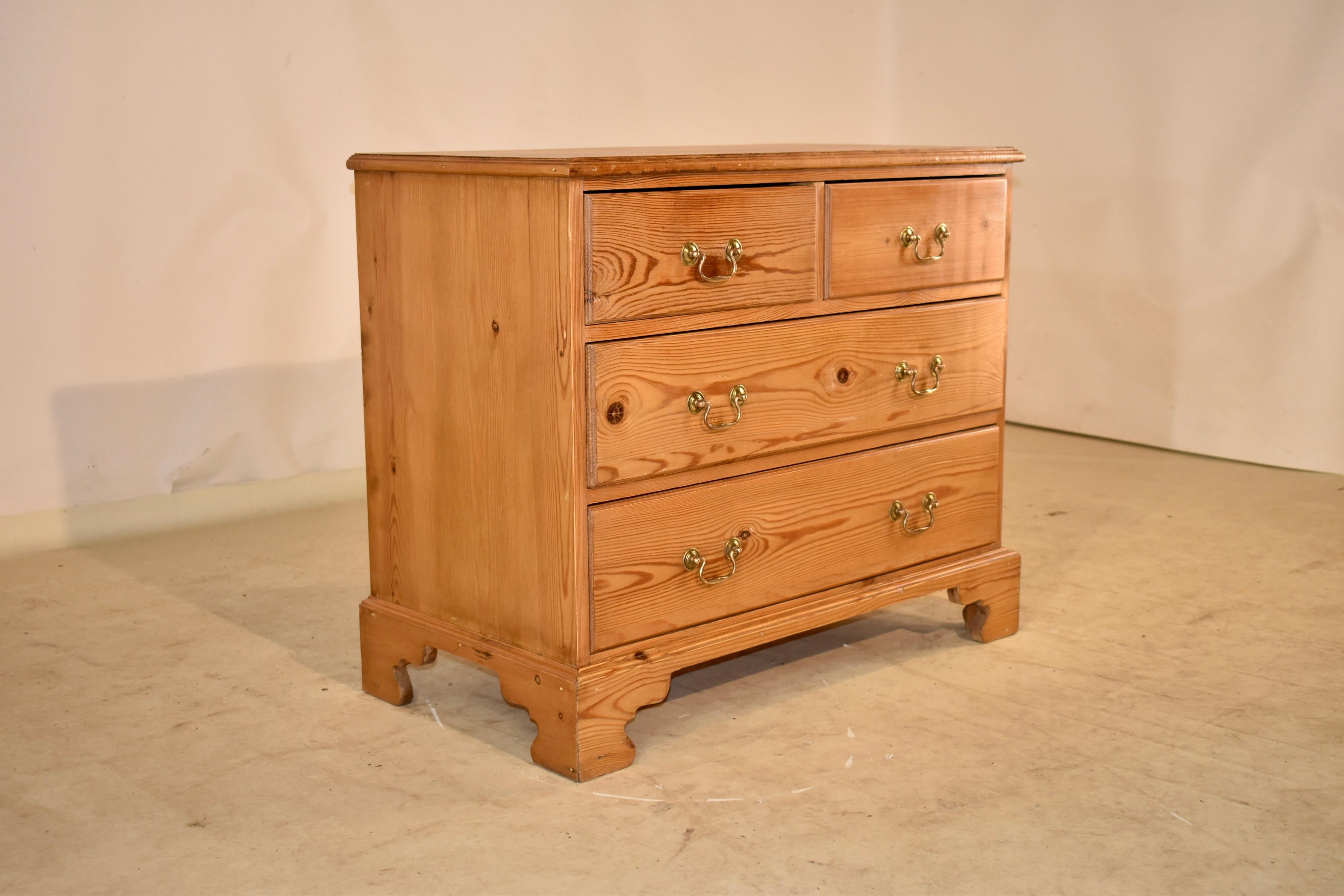 Mid-20th century pine chest of drawers from England with a beveled edge around the top, following down to simple sides and two drawers over two drawers in the front. The drawer fronts are all made from lovely grained single boards. The bottom of the