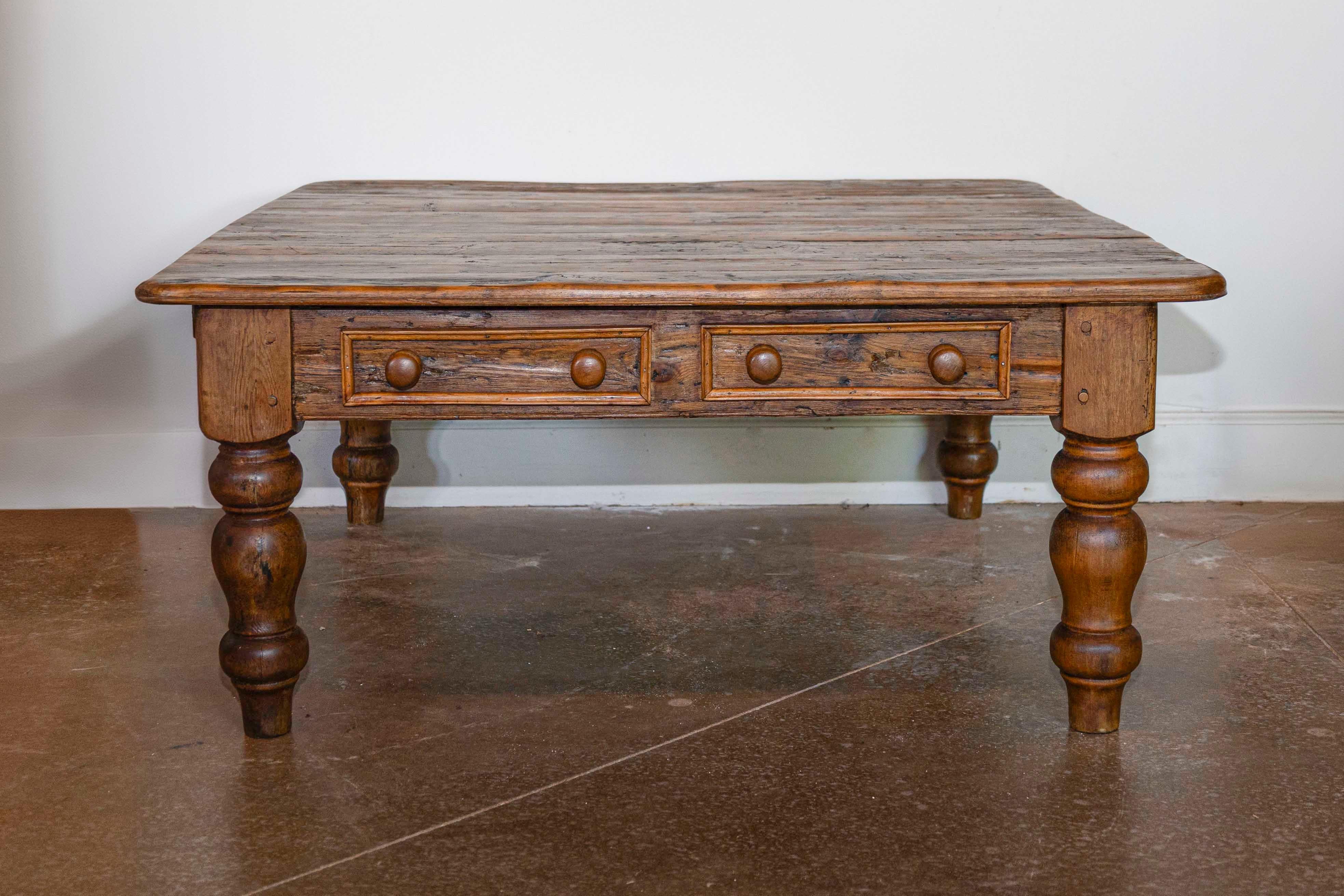 This antique English pine coffee table exudes rustic charm and timeless appeal, making it a perfect centerpiece for any living space. Crafted in solid pine, it showcases a natural patina that highlights the wood’s grain and texture, reflecting its