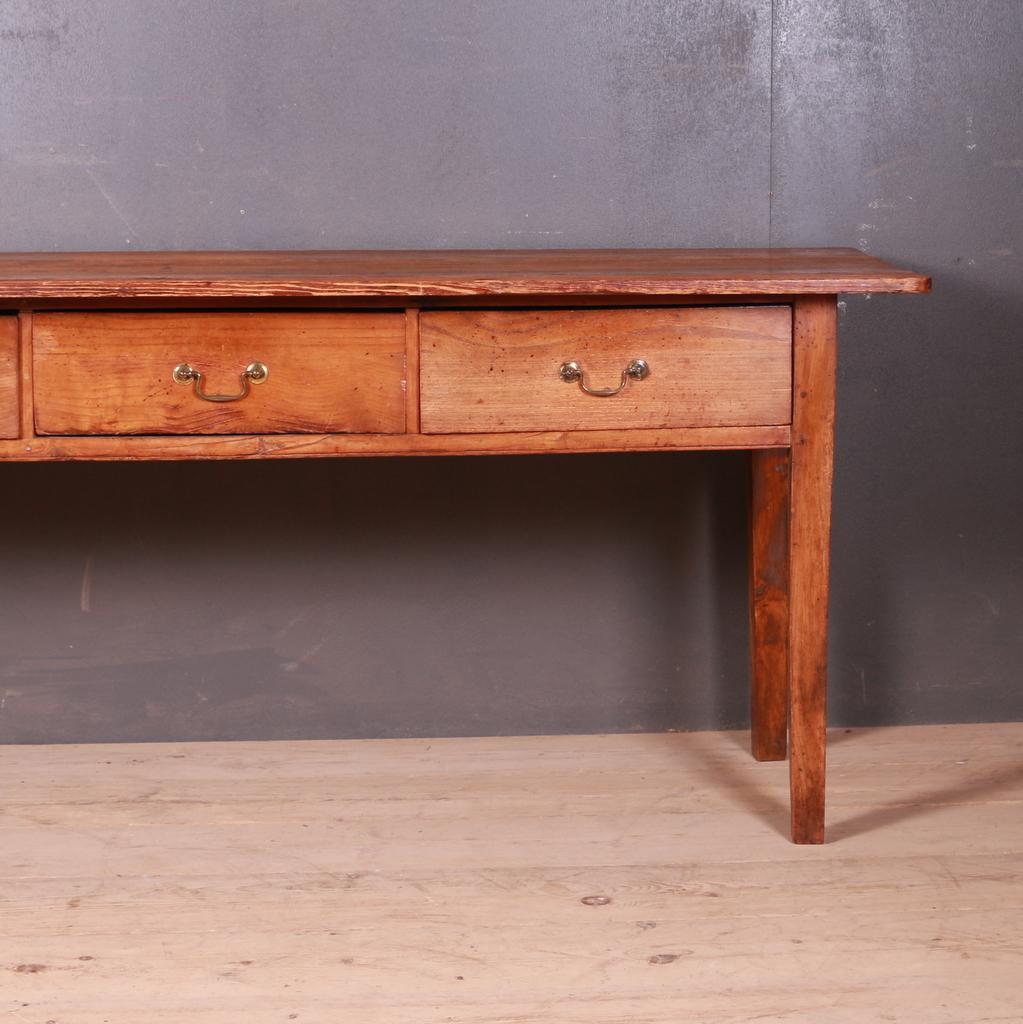 19th century English pine three-drawer dresser base. Lovely original condition, 1860.

Dimensions
73.5 inches (187 cms) wide
23.5 inches (60 cms) deep
29.5 inches (75 cms) high.