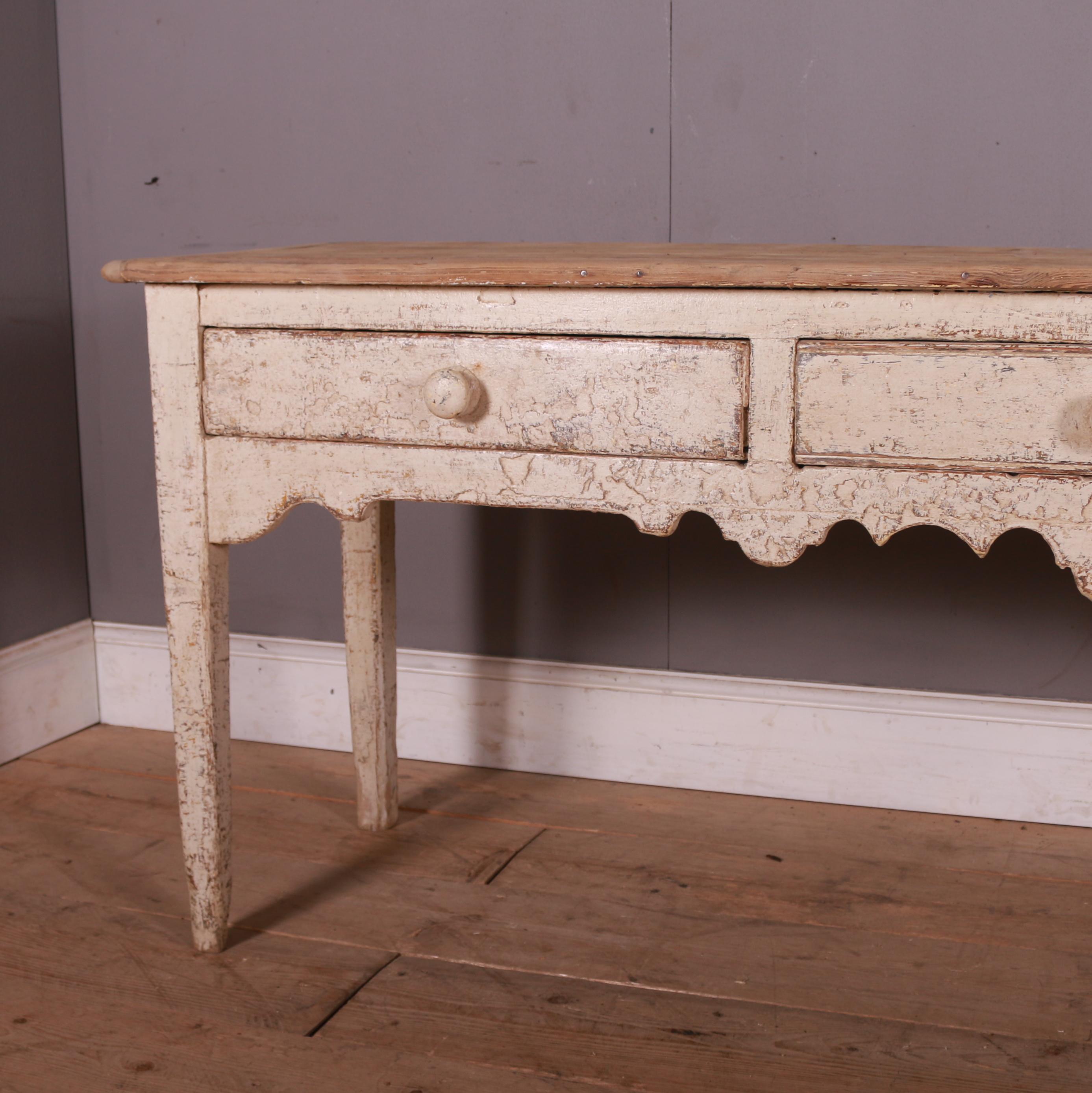 Good early 19th C English 3 drawer pine dresser base with a rustic scrubbed top. 1820.

Reference: 7334

Dimensions
82 inches (208 cms) wide
20 inches (51 cms) deep
30.5 inches (77 cms) high.