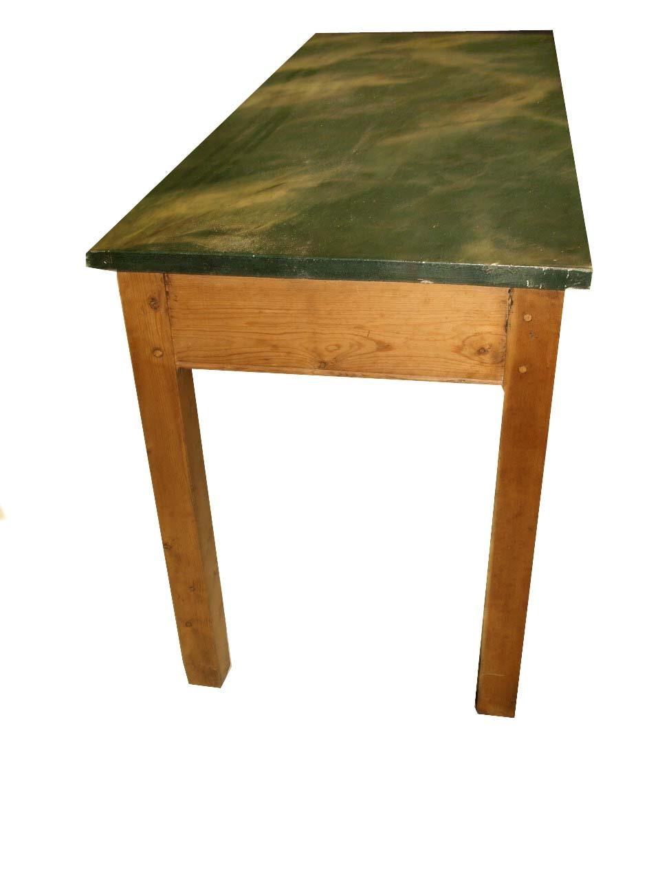 English pine faux marble console table, the faux painted top simulates a beautifully grained verde marble, the straight legs with exposed double peg construction. The apron has an incised line at the bottom that continues on all four sides, this