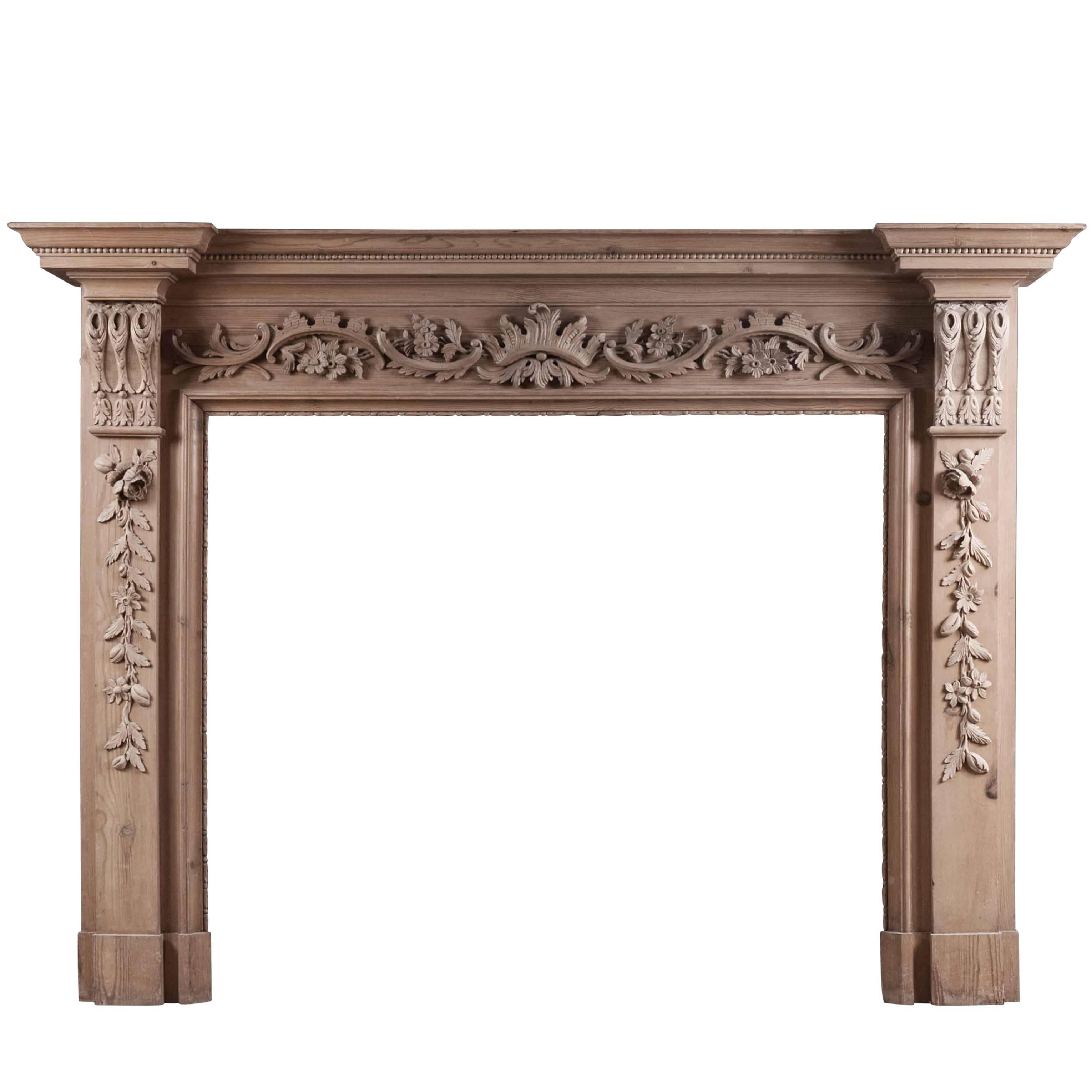 English Pine Fireplace with Carved Fruit & Foliage For Sale