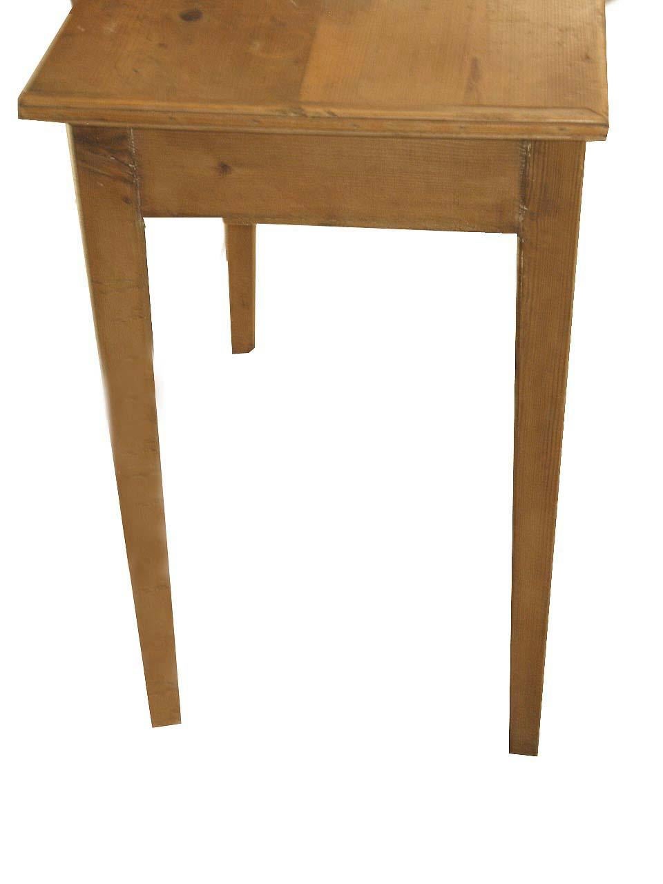 English pine one drawer table, this table has what is commonly referred to in the trade as a ''stripped pine'' finish which is simply beeswax and then rubbed down. The drawer has swan neck pulls which, although are not original, are handmade