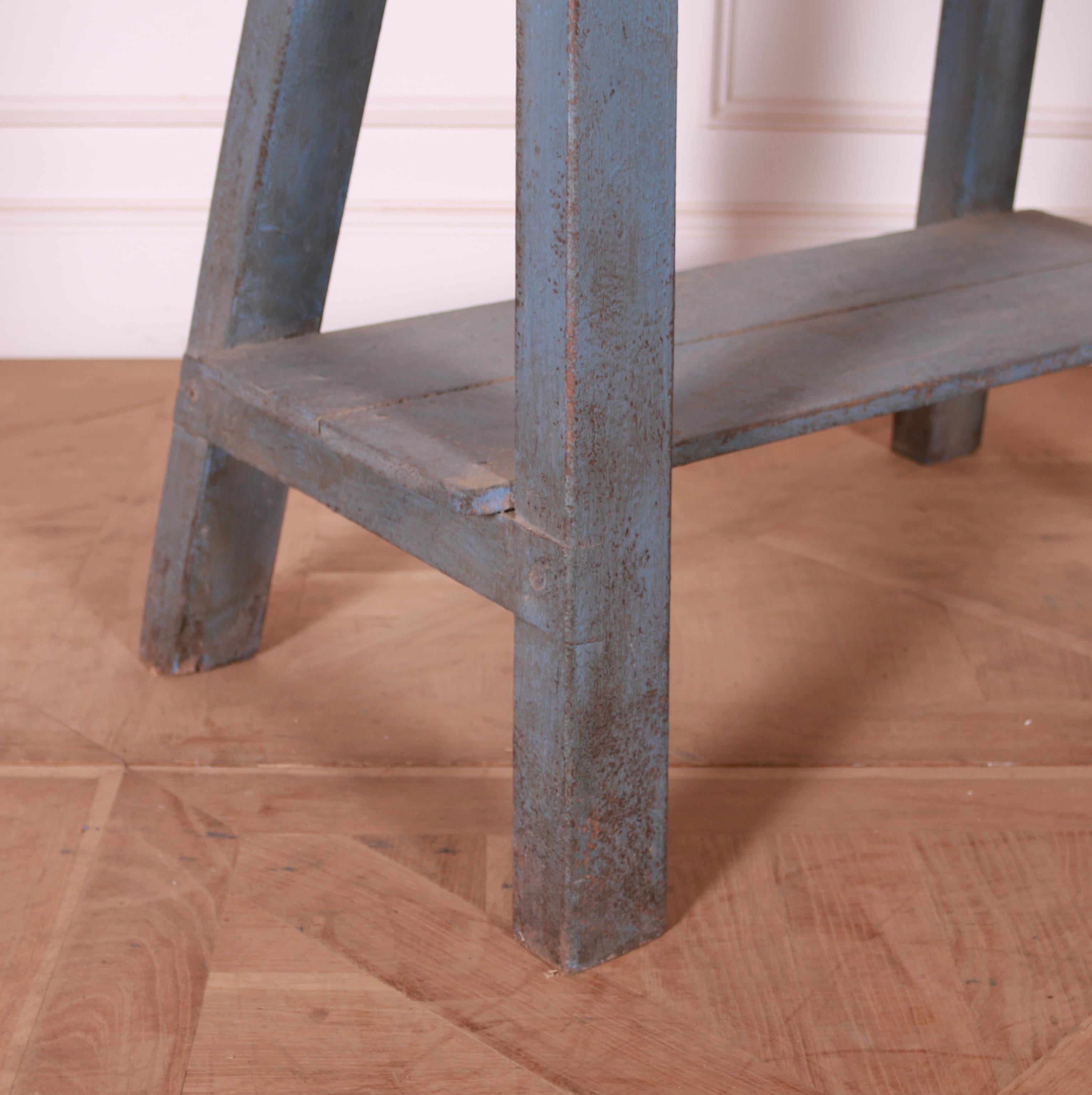 Small English painted and scrubbed pine trestle table. 1890.

Top depth of 15