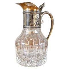 Antique English Pitcher With Silver-Plated Handle From the Turn of the Centuries