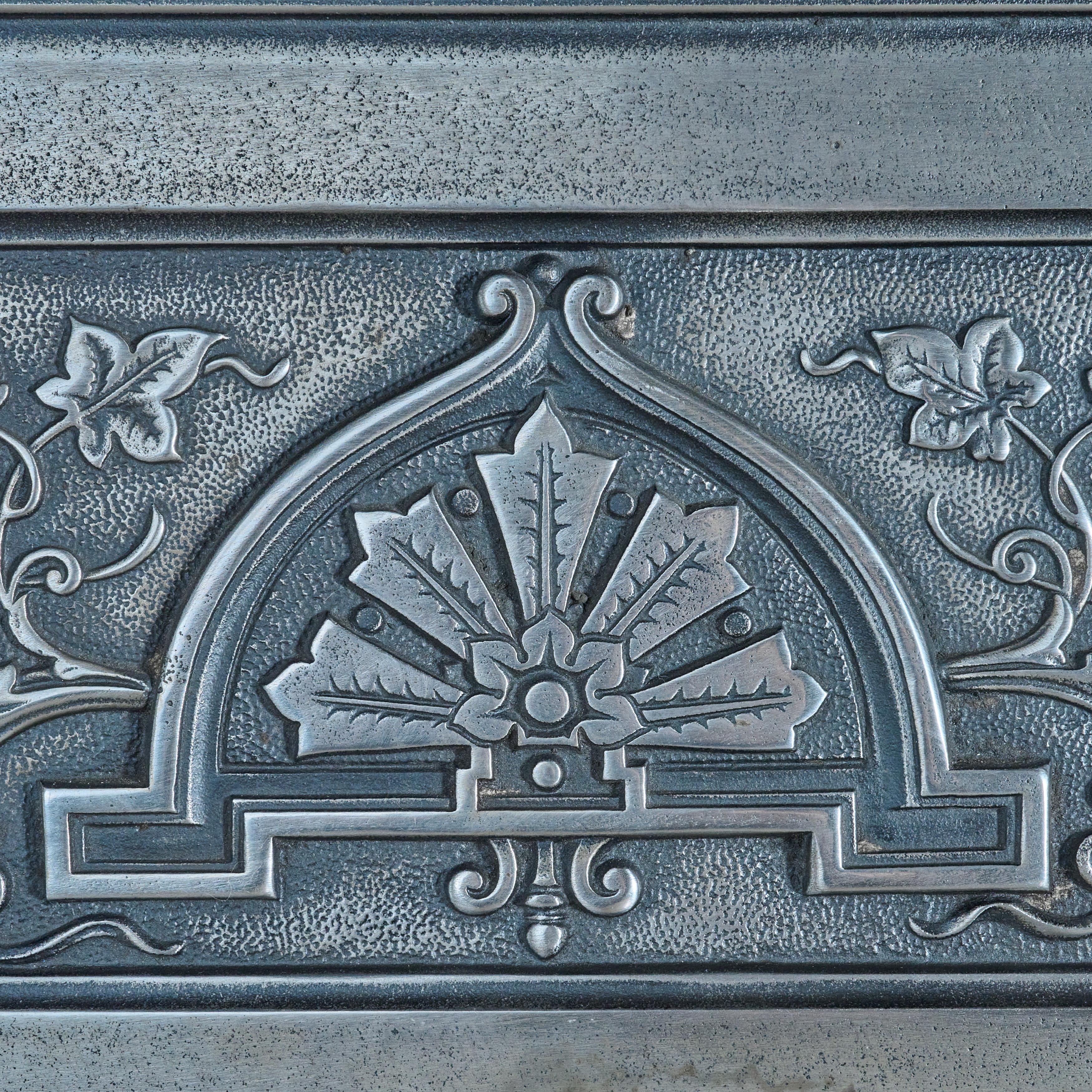 Late 19th Century English Polished Cast Iron Fireplace Surround For Sale