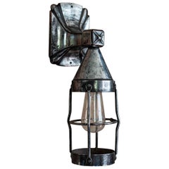 Antique English Polished Cast Iron Outdoor Cage Lamp, circa 1920