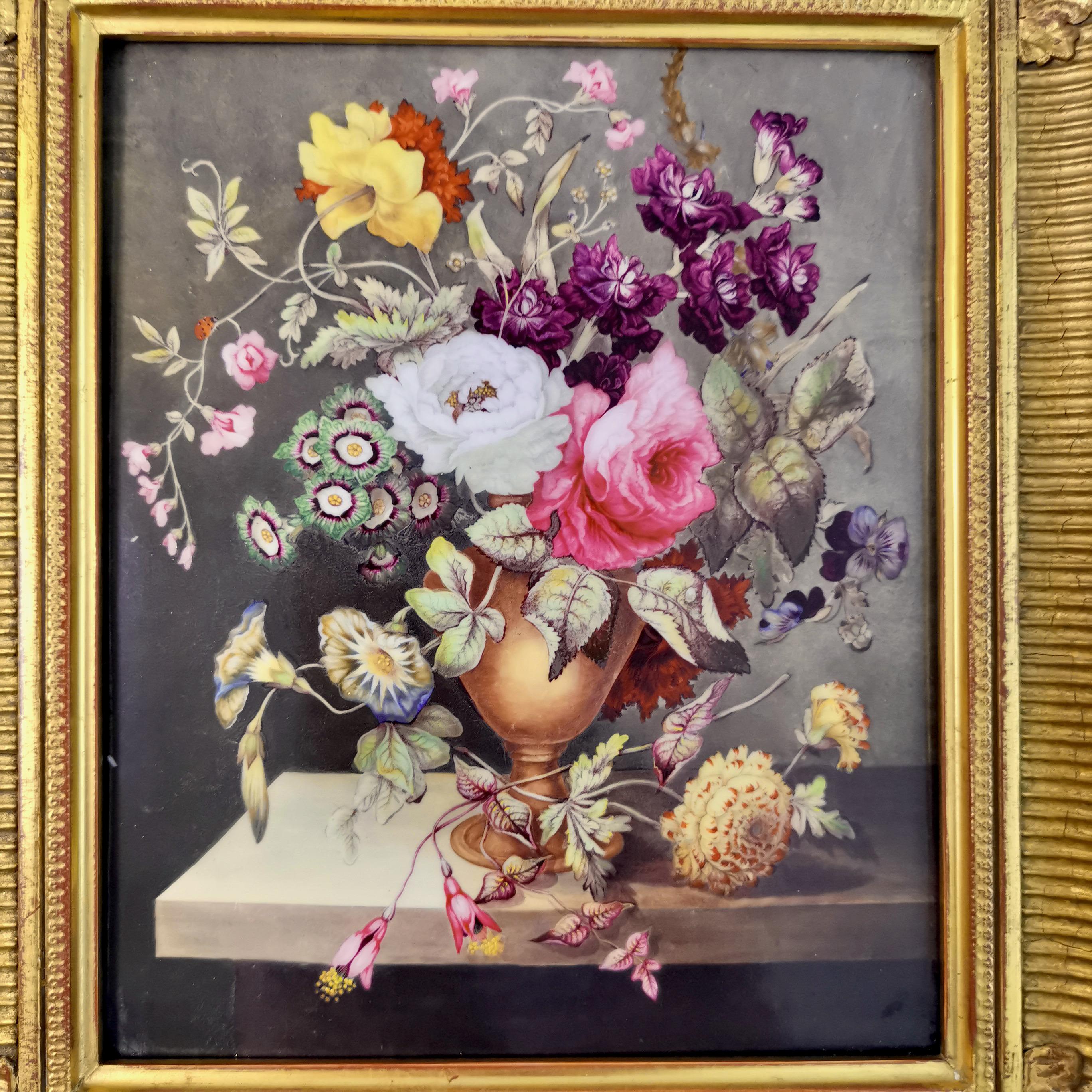 This is a beautiful porcelain plaque with a lavish flower bouquet, set in a gilt wood frame. It was made in England in about 1825.
 
This plaque has provenance: it once belonged to the Margaret Cadman Collection and it later belonged to the