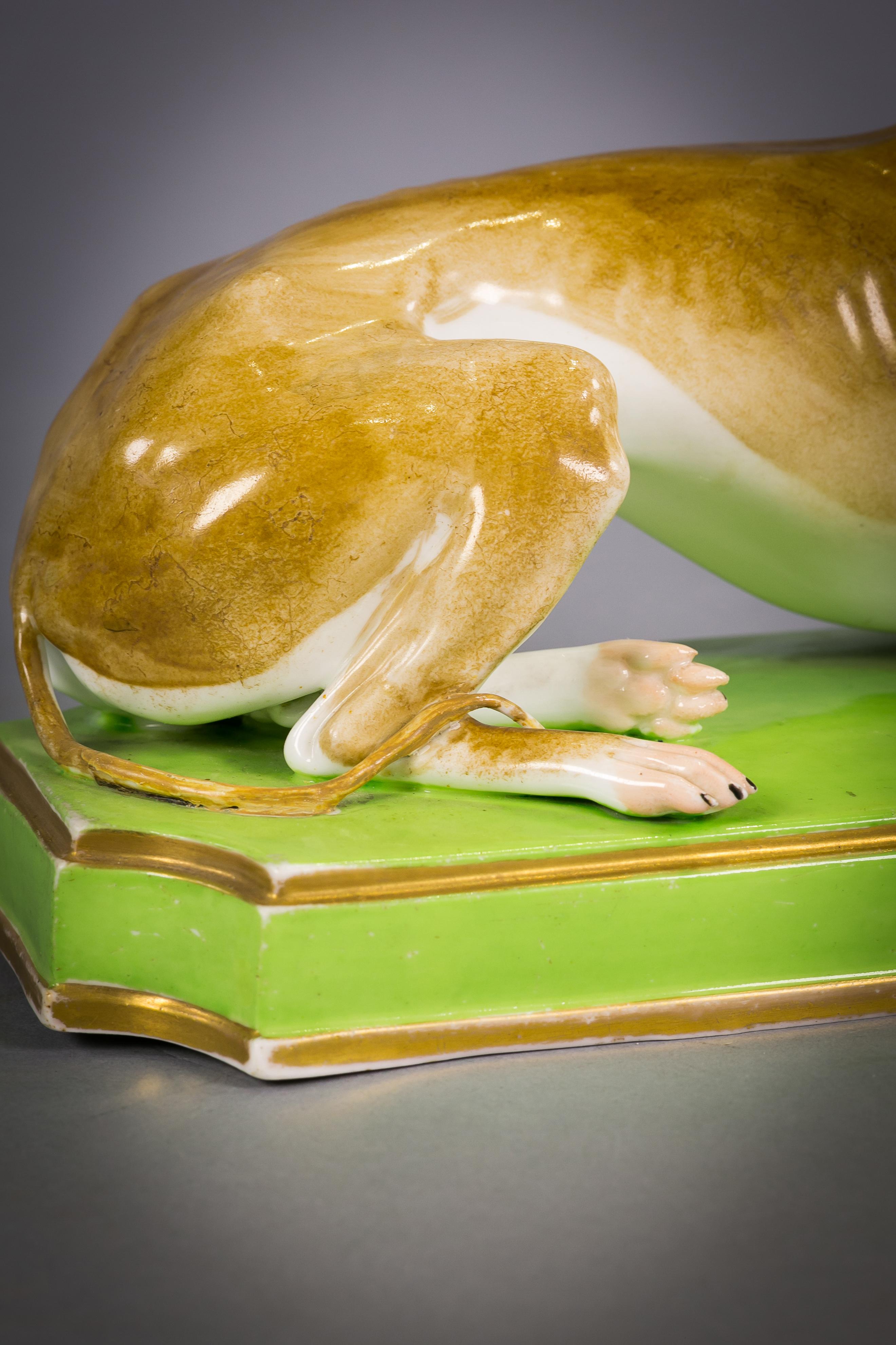 19th Century English Porcelain Reclining Greyhound, circa 1810 For Sale