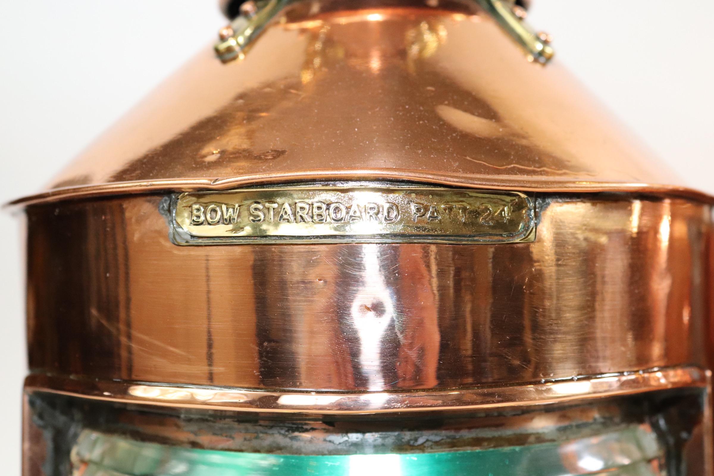 Pair of Anderson and Gyde port and starboard ships lanterns with Fresnel glass lenses, brass badges, vented chimney tops. Both have been wired with new sockets for home display. Weight is 28 pounds the pair.