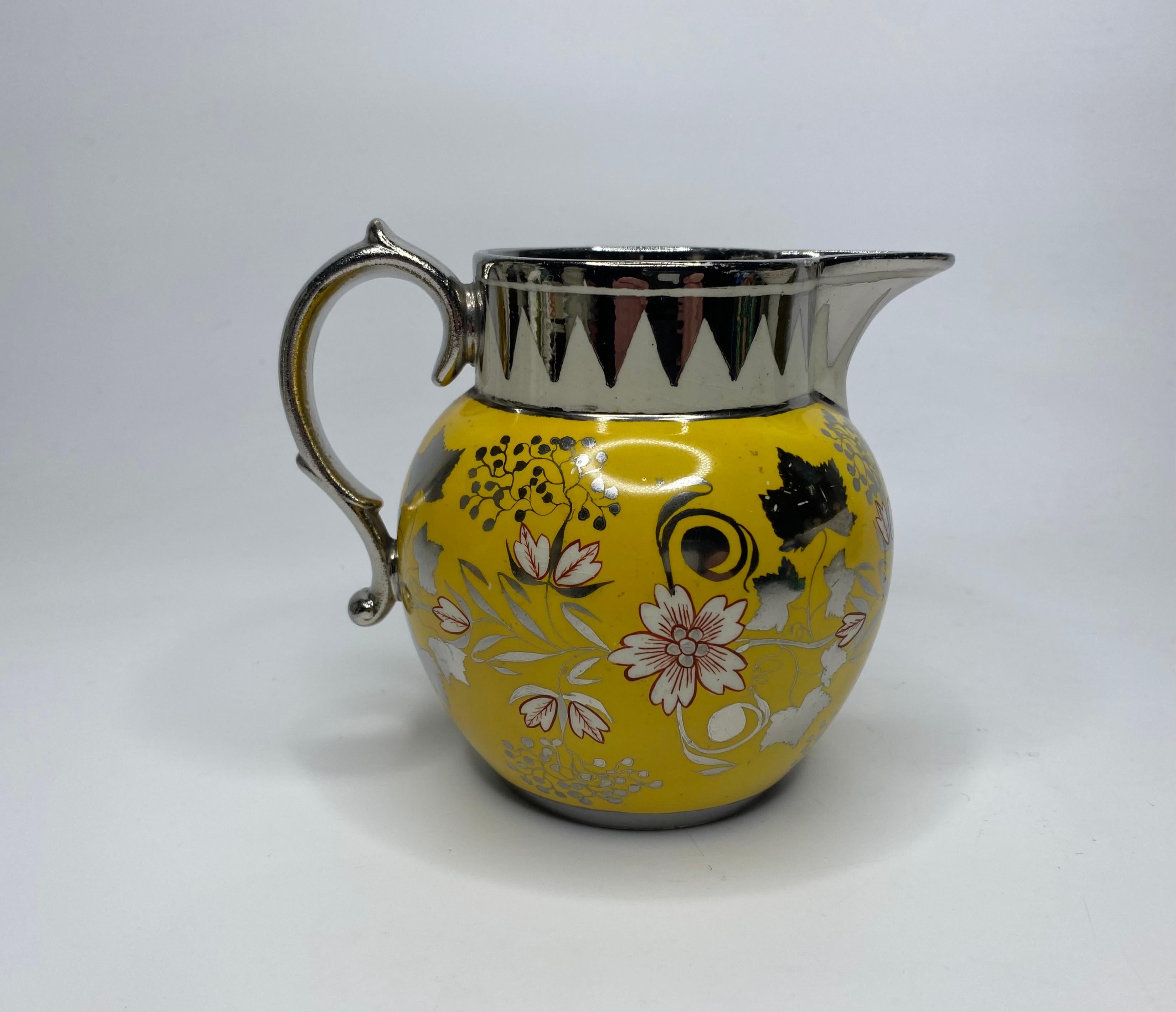 Fired English pottery ‘Canary Yellow’ silver lustre jug, c. 1820.
