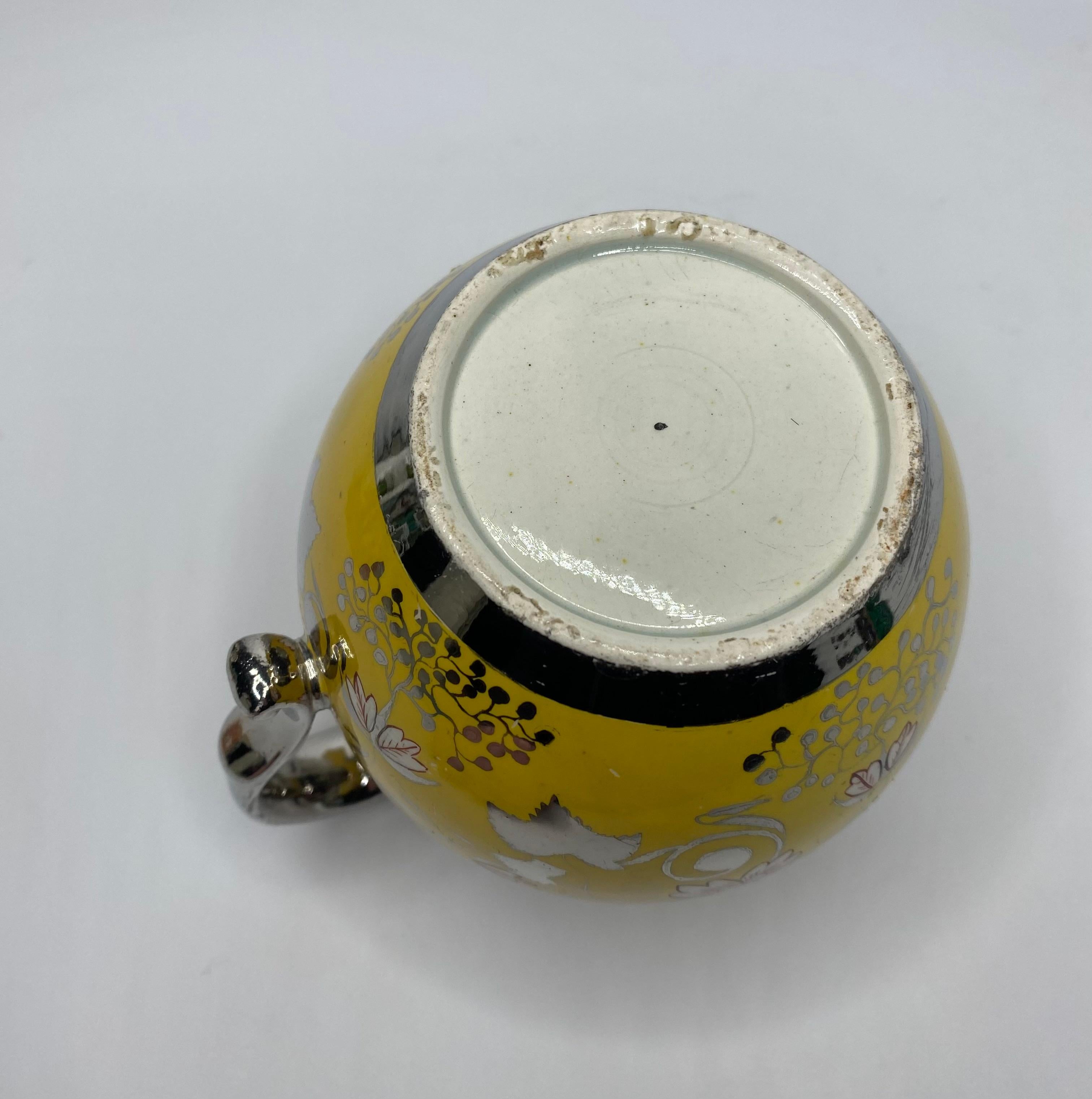 English pottery ‘Canary Yellow’ silver lustre jug, c. 1820. 1