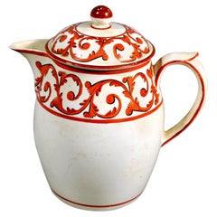 English Pottery Covered Jug and Cover with Orange Foliate Scroll Designs