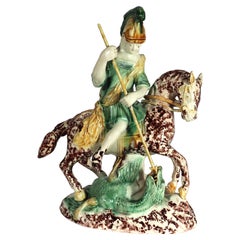 Englische Bleiglasierte Steingutfigur des heiligen Georgs und des Drachens aus englischer Keramik