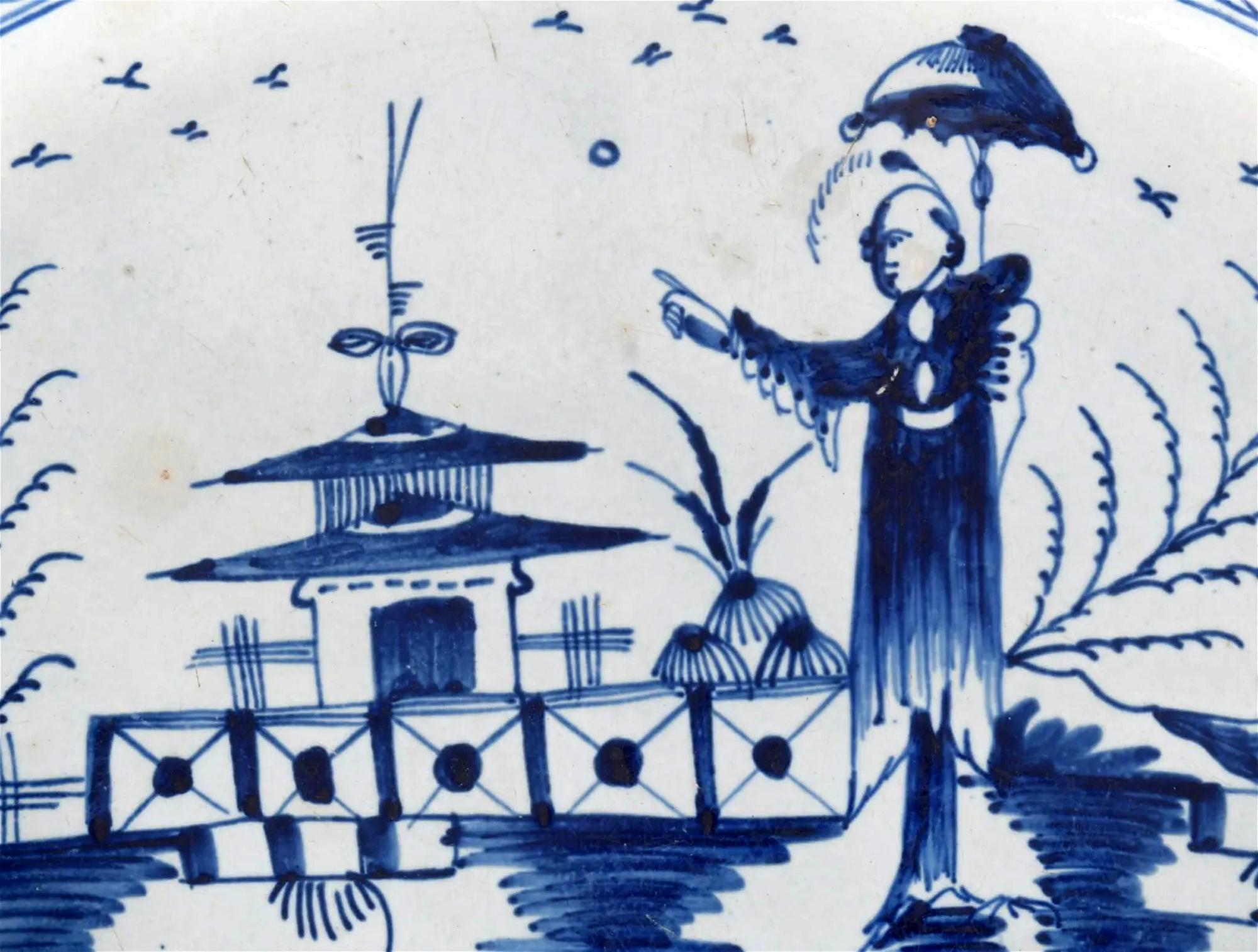 Plato ovalado azul y blanco de cerámica inglesa Pearlware con decoración chinoiserie Georgiano en venta