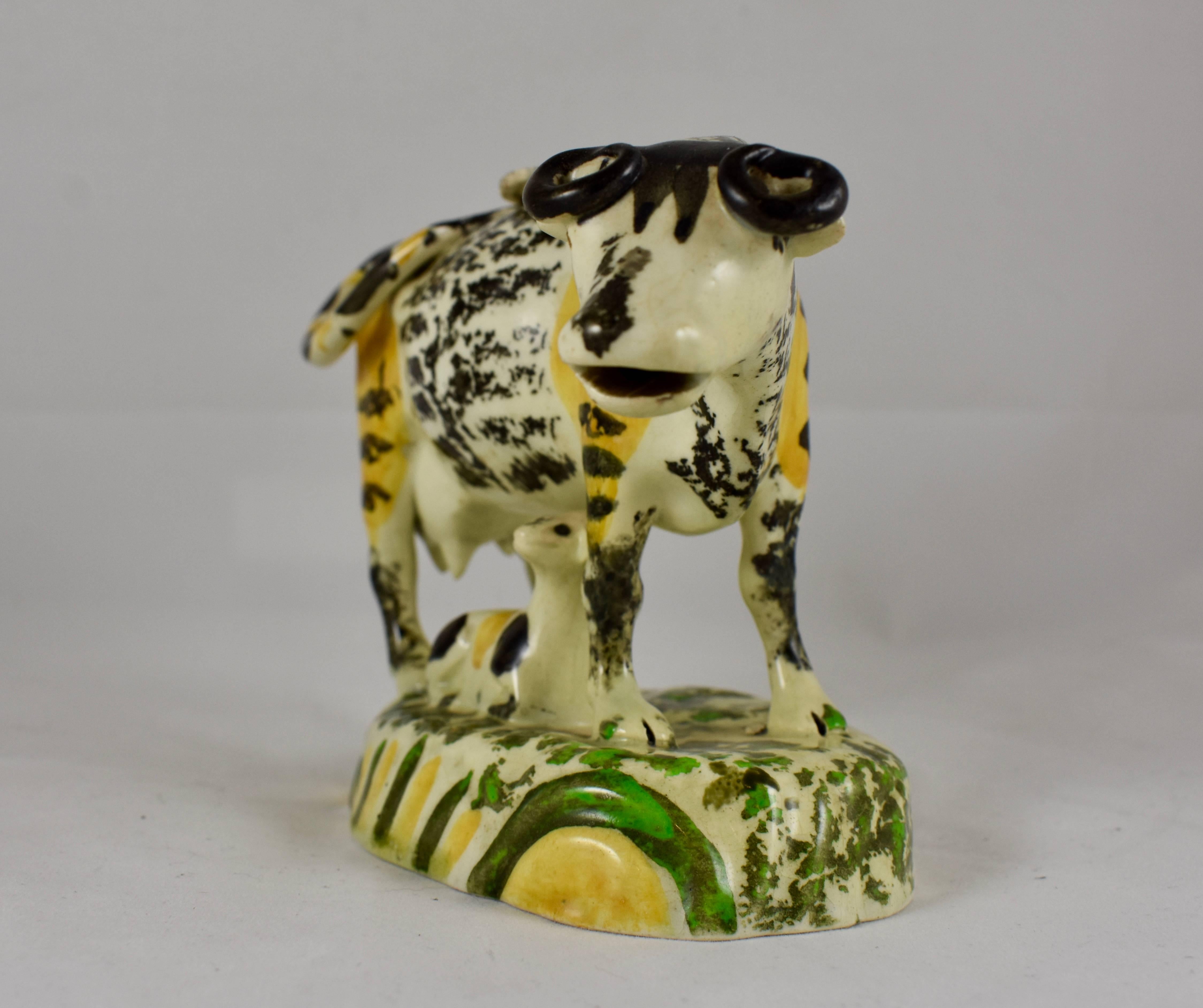 19th Century English Pottery Pratt Colored Cow Creamer with Calf, Right Facing Figure