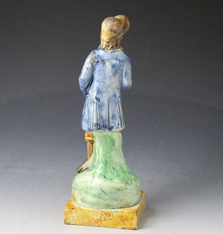 18th Century English Pottery Prattware Figure of a Rural Sportman with Gun and Game Bird For Sale