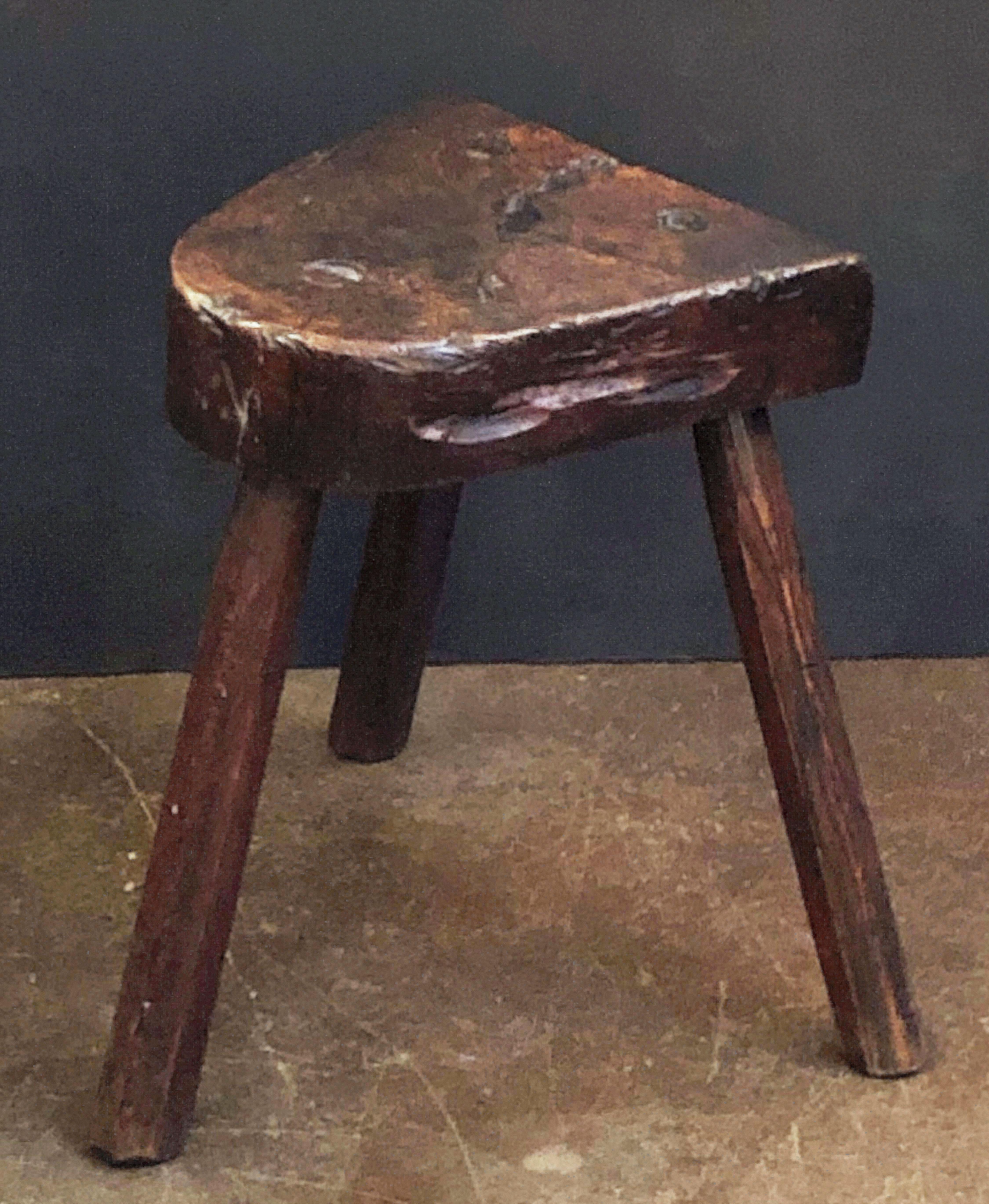 rustic milking stool