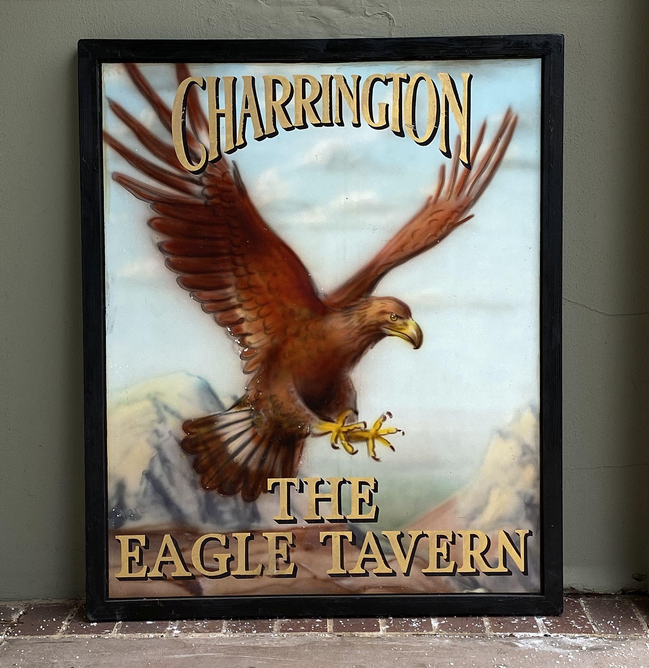 An authentic English pub sign (one-sided) featuring a painting of an eagle in flight with mountains in the background, entitled: Charrington - The Eagle Tavern.

A very fine example of vintage advertising artwork, ready for display.

Charrington &