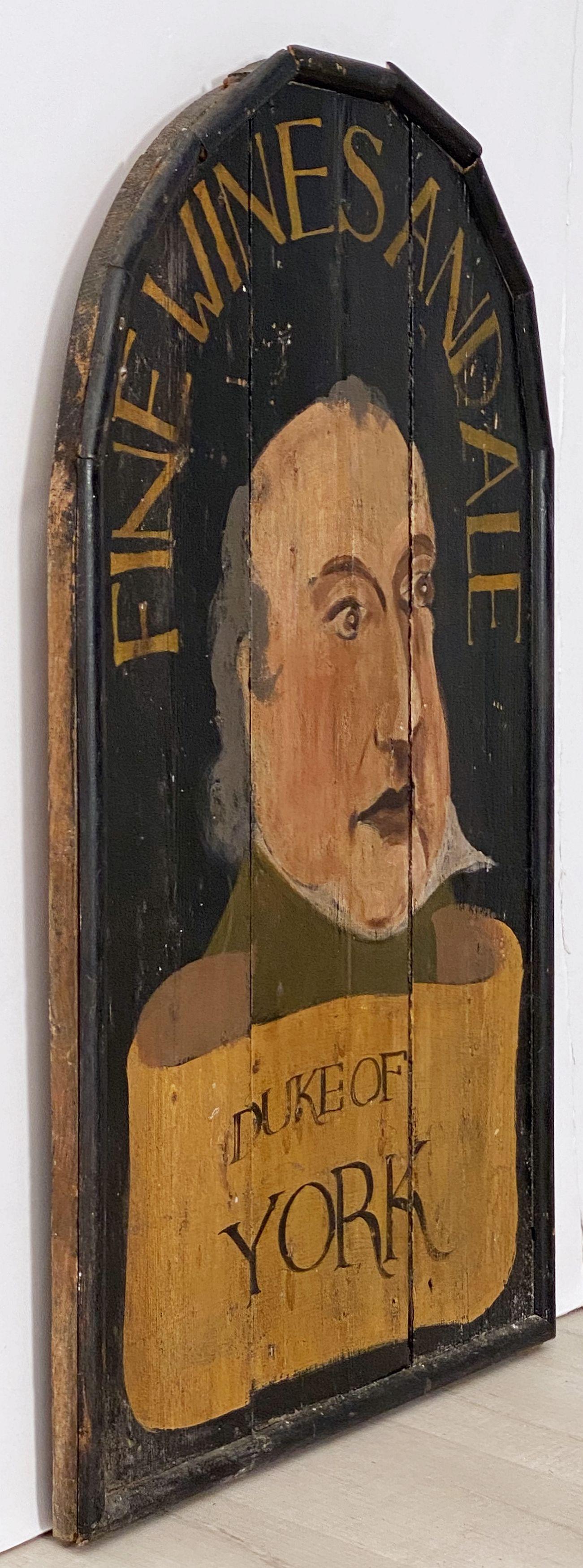 An authentic English pub sign (one-sided) featuring a portrait painting of a former Duke of York, entitled: Fine Wines and Ale - Duke of York.

A very fine example of vintage advertising artwork and ready for display.