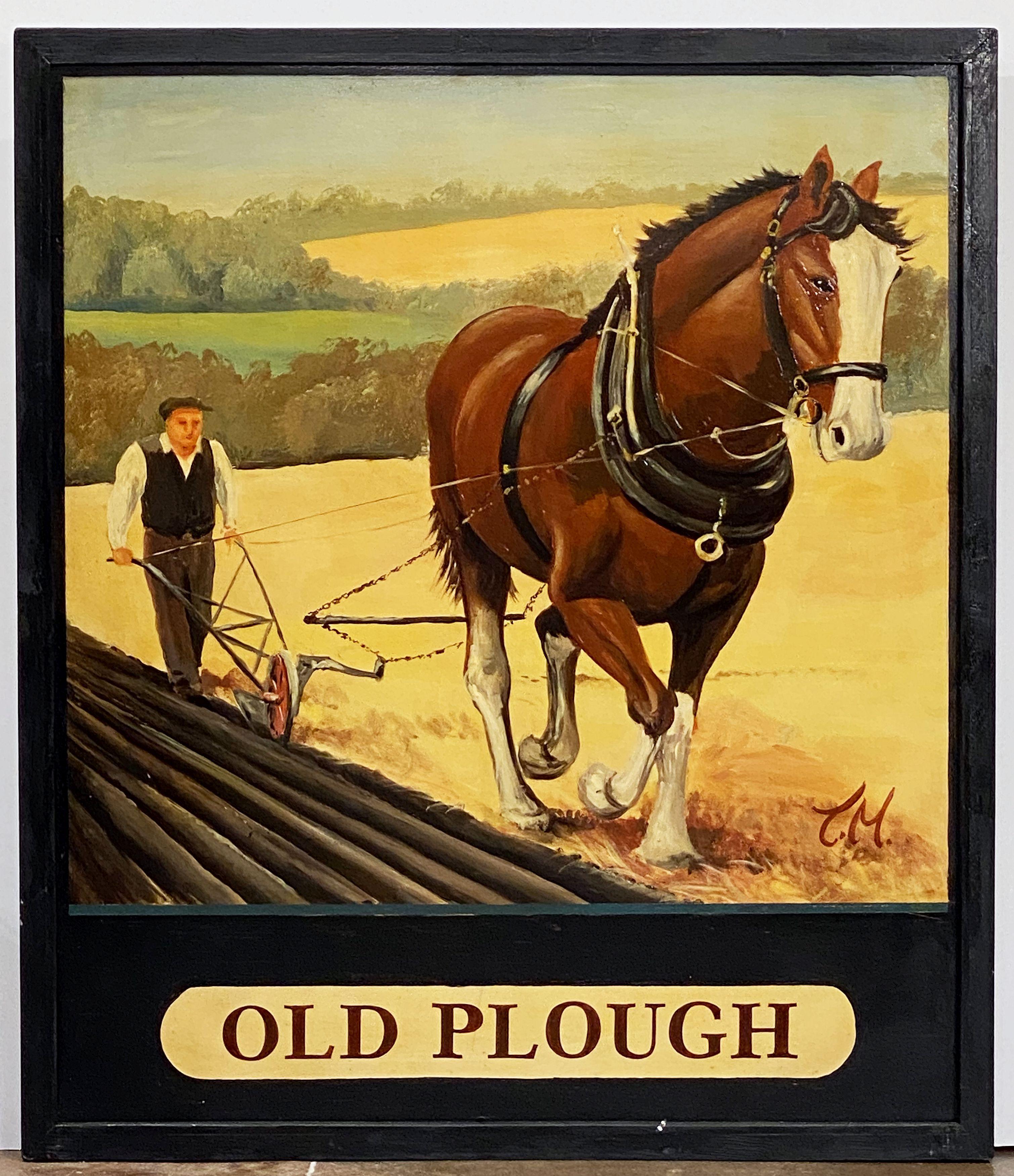 An authentic English pub sign (one-sided) featuring a painting of a man and horse plowing a field, entitled: Old Plough

A very fine example of vintage advertising artwork and ready for display.