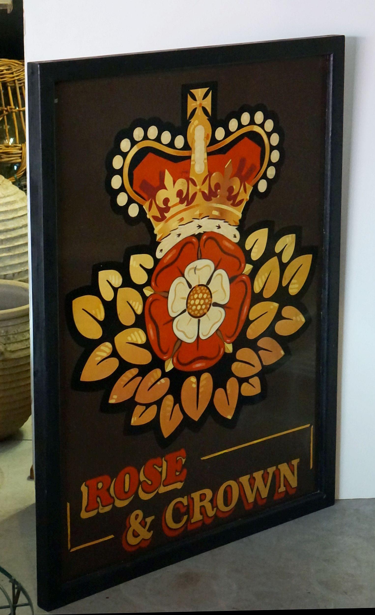 An authentic English pub sign (two-sided) featuring a painting of the British crown over a Tudor Rose, entitled: Rose and Crown.

Rose and Crown: Edward III used a golden rose as a personal badge, and two of his sons adapted it by changing the