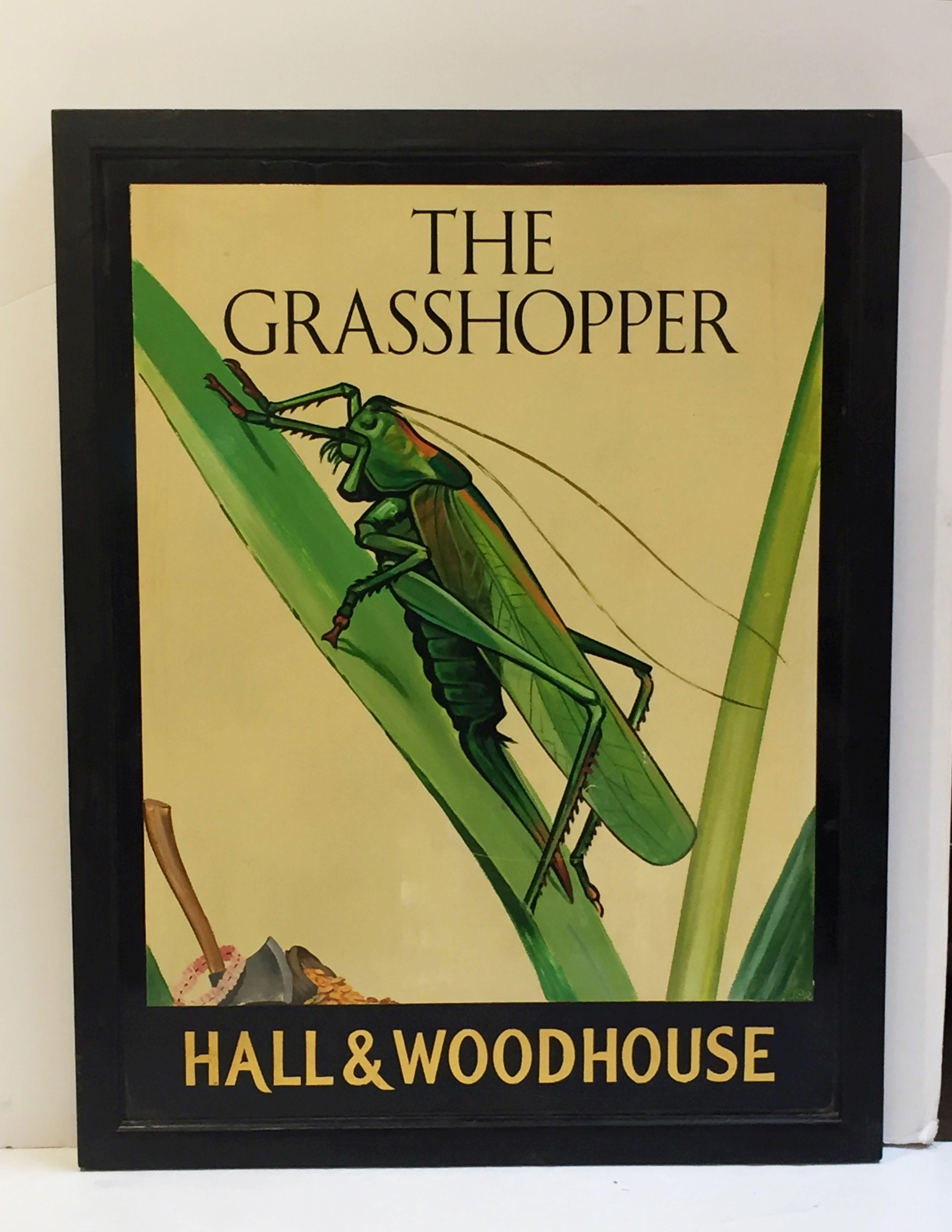 An authentic English pub sign (one-sided) featuring a painting of a grasshopper on a blade of grass, entitled: The Grasshopper

Marked: Hall & Woodhouse

Hall and Woodhouse is a British regional brewery founded in 1777 by Charles Hall in