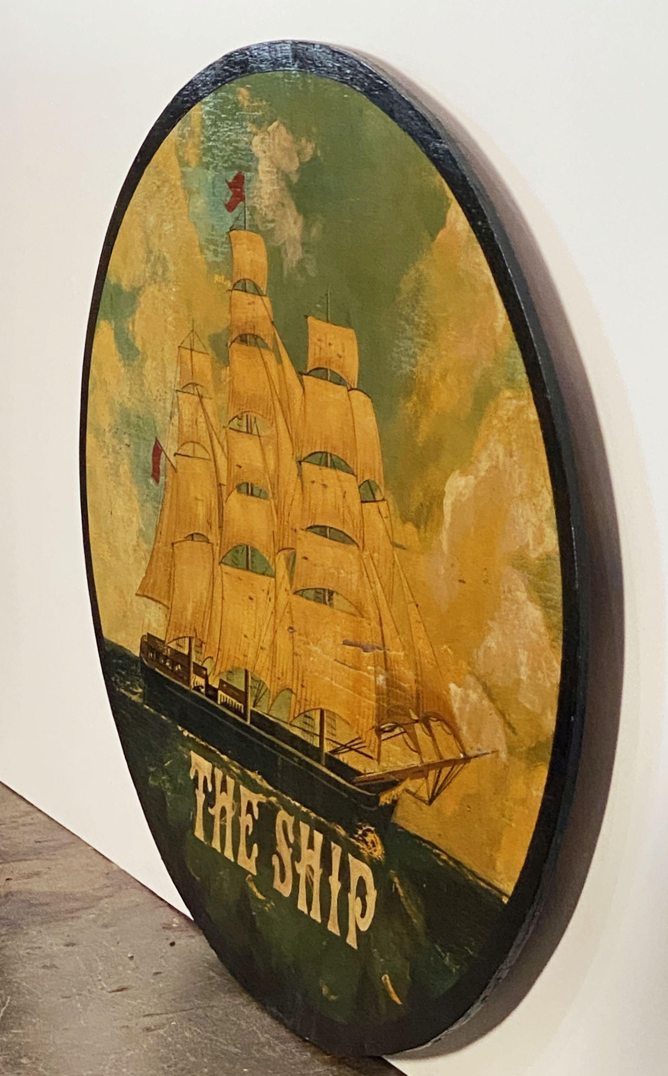 An authentic English pub sign (one-sided) featuring a painting of a three-masted sailing ship upon the sea, entitled: The Ship, on an oval wood backing or support.

A very fine example of vintage advertising artwork and ready for display.