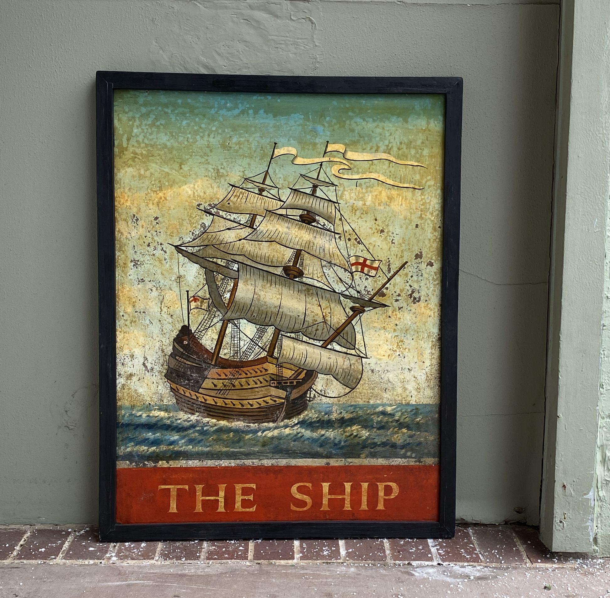 An authentic English pub sign (one-sided) featuring a painting of a British brigantine or two-mast sailing ship featuring flags with St. George's cross, entitled: The Ship.

A very fine example of vintage advertising artwork, ready for display.

