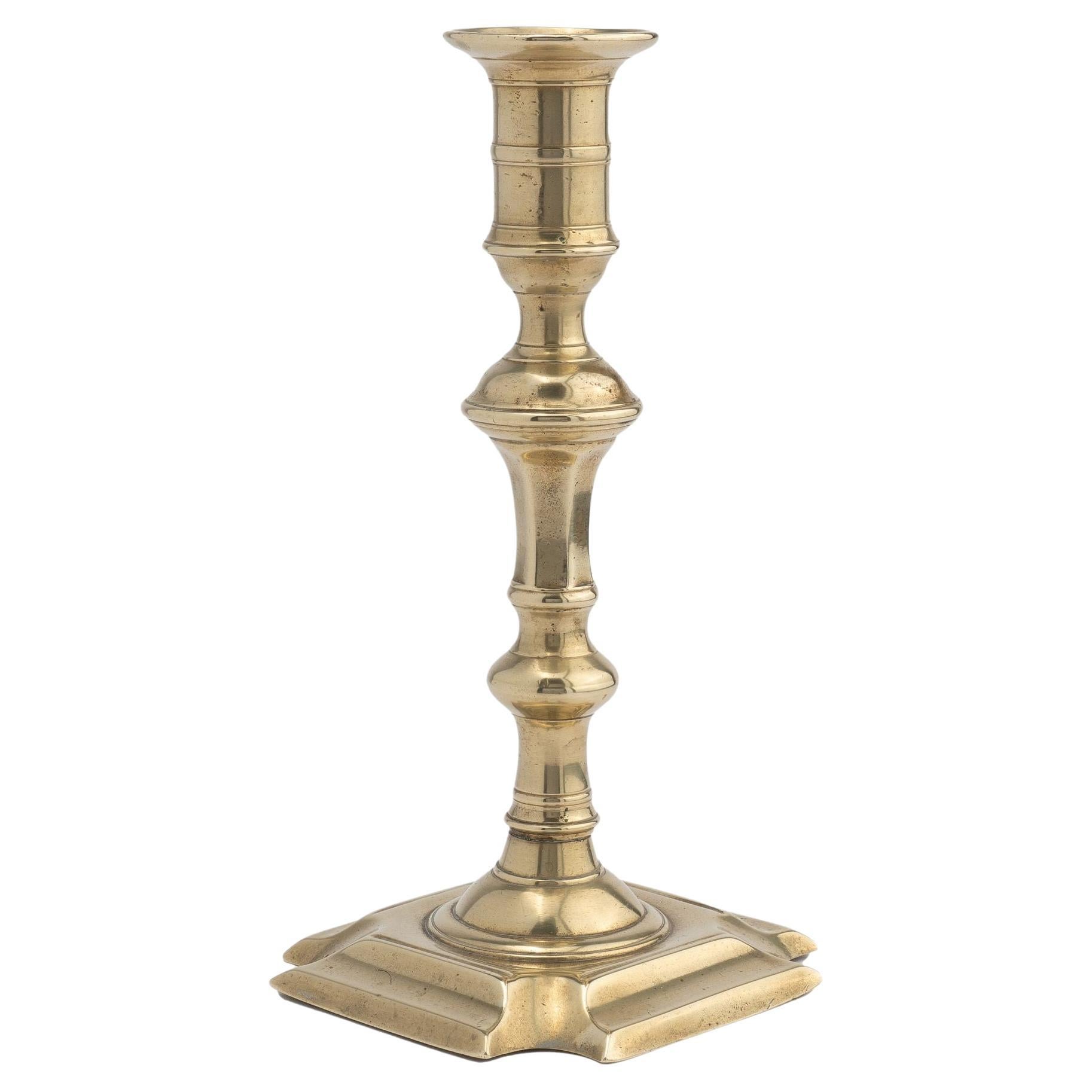 English Queen Anne brass candlestick, 1750-60 For Sale