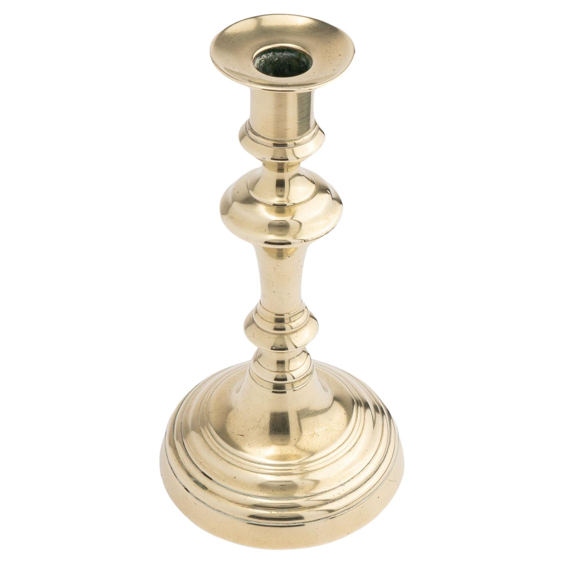 English Queen Anne brass candlestick with knob stem, 1770 For Sale