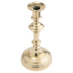 English Queen Anne brass candlestick with knob stem, 1770