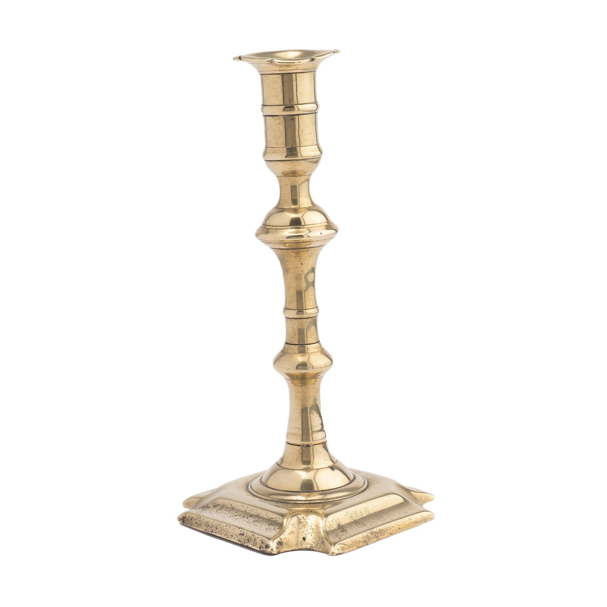British English Queen Anne cast brass baluster shaft candlestick, 1740-60 For Sale