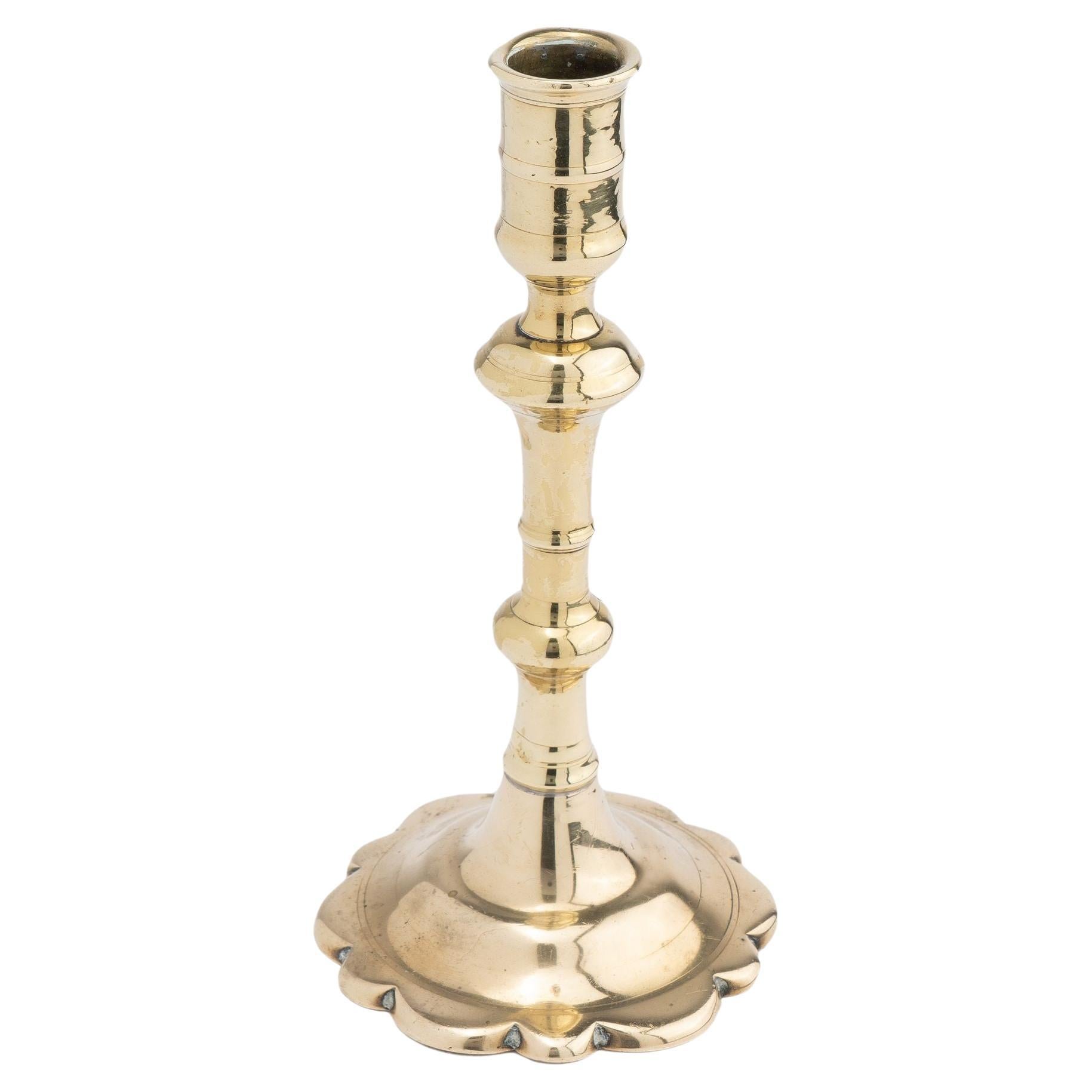 English Queen Anne cast brass candlestick, c. 1760 For Sale