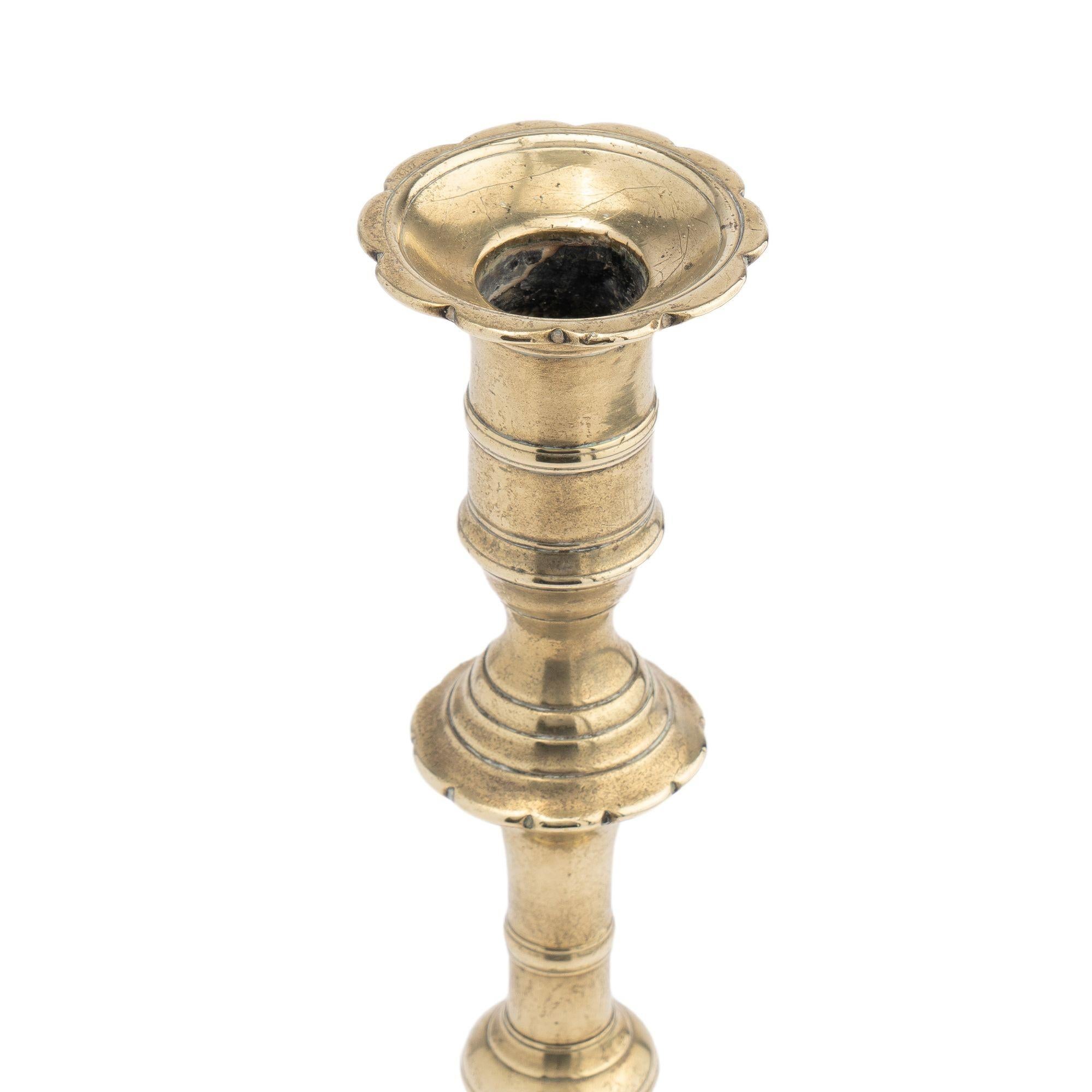 English Queen Anne cast brass cove cut corner base candlestick, 1725-50 In Good Condition For Sale In Kenilworth, IL