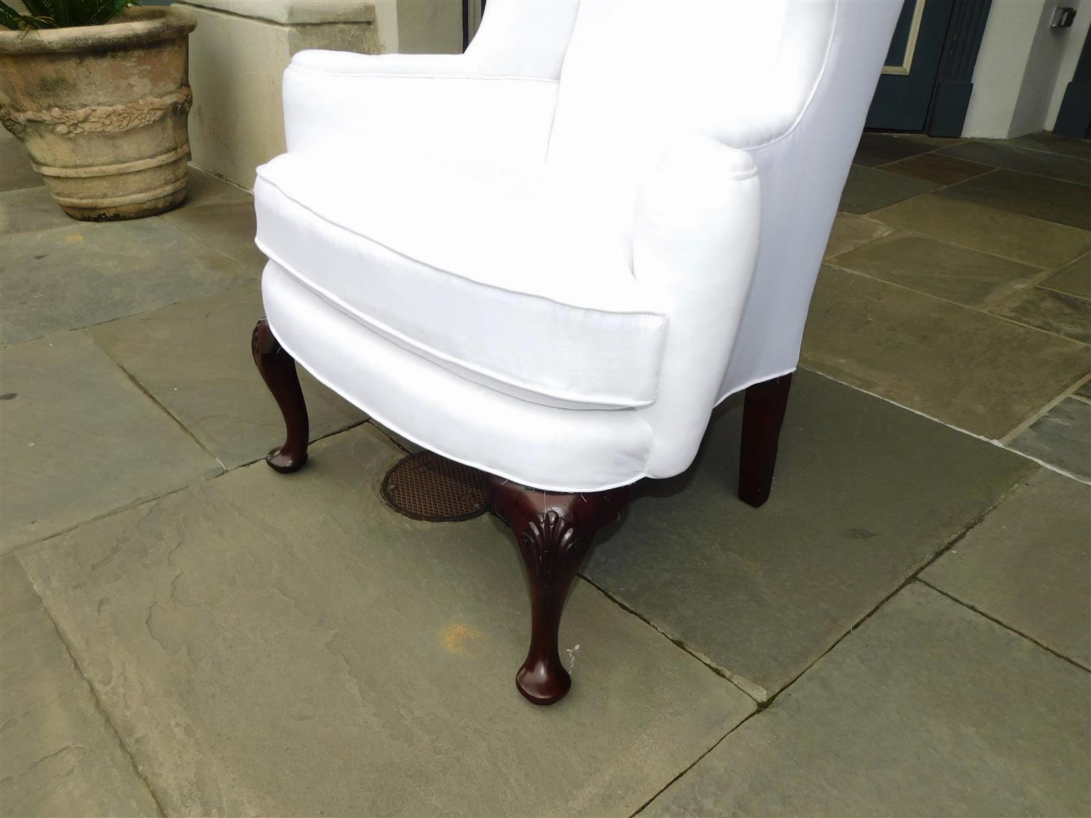 Muslin English Queen Anne Mahogany Wing Back Chair with Shell Knee on Pad Feet, C. 1740 For Sale