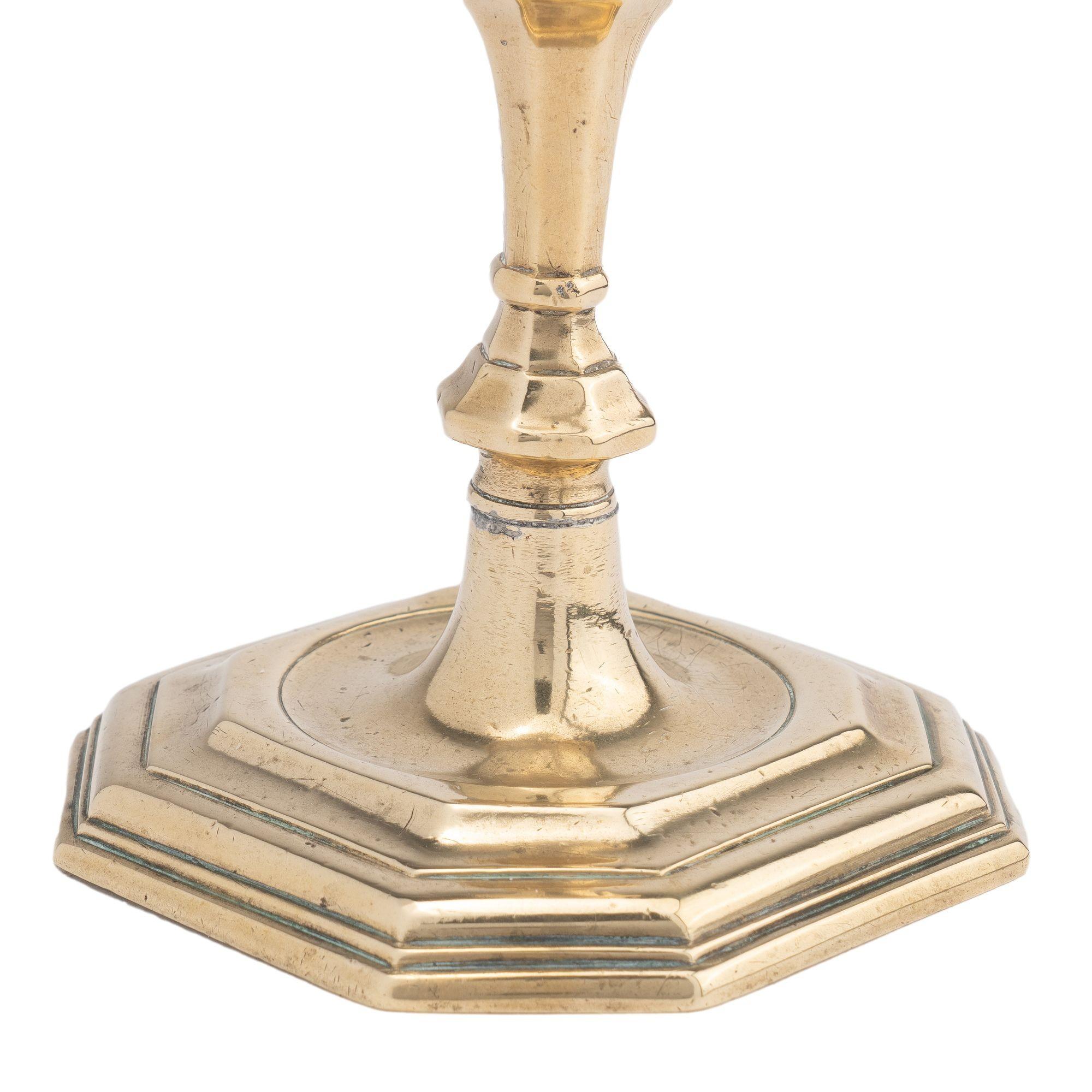 Brass English Queen Anne octagonal base brass candlestick, 1710-20
