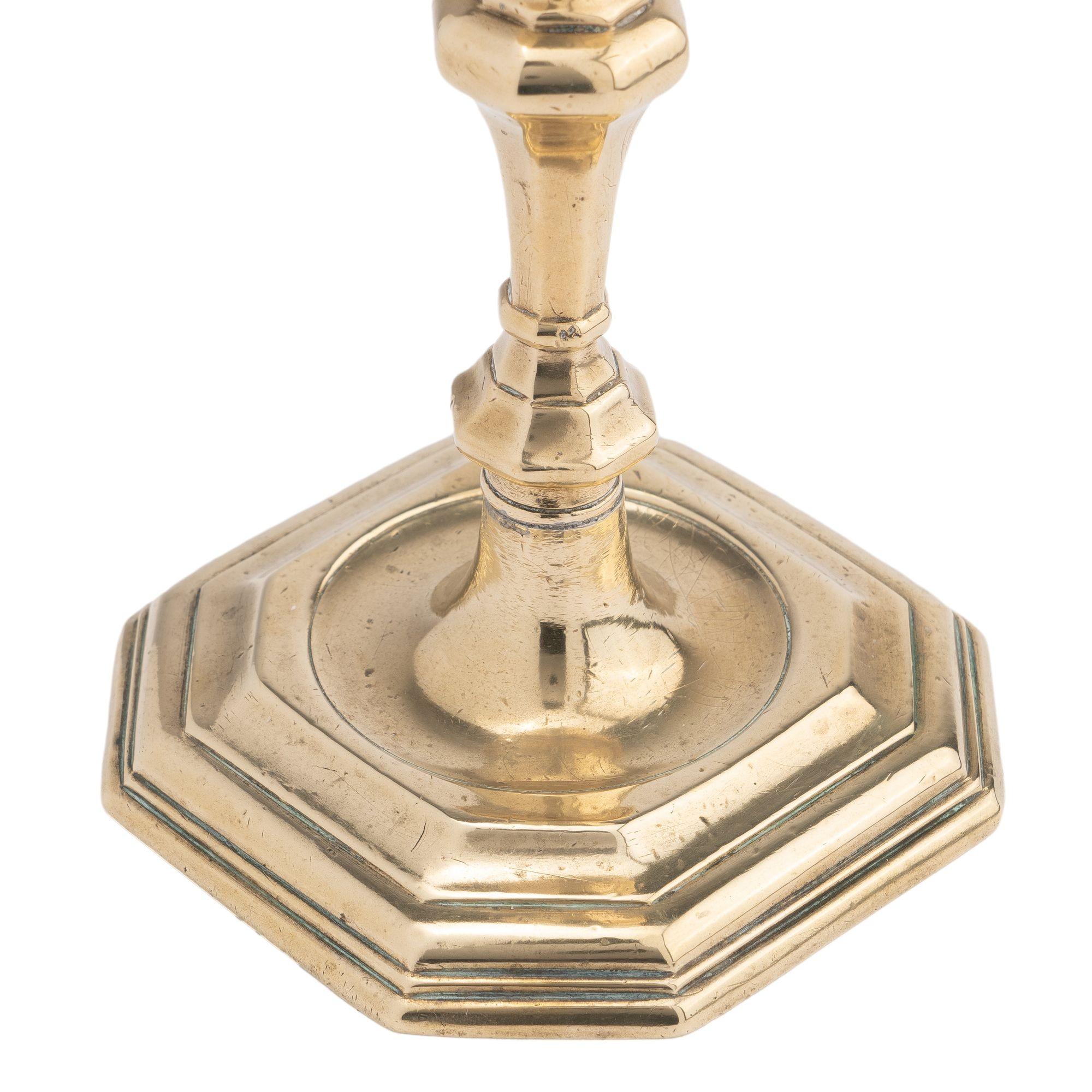 English Queen Anne octagonal base brass candlestick, 1710-20 1