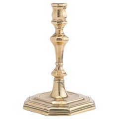 English Queen Anne octagonal base brass candlestick, 1710-20
