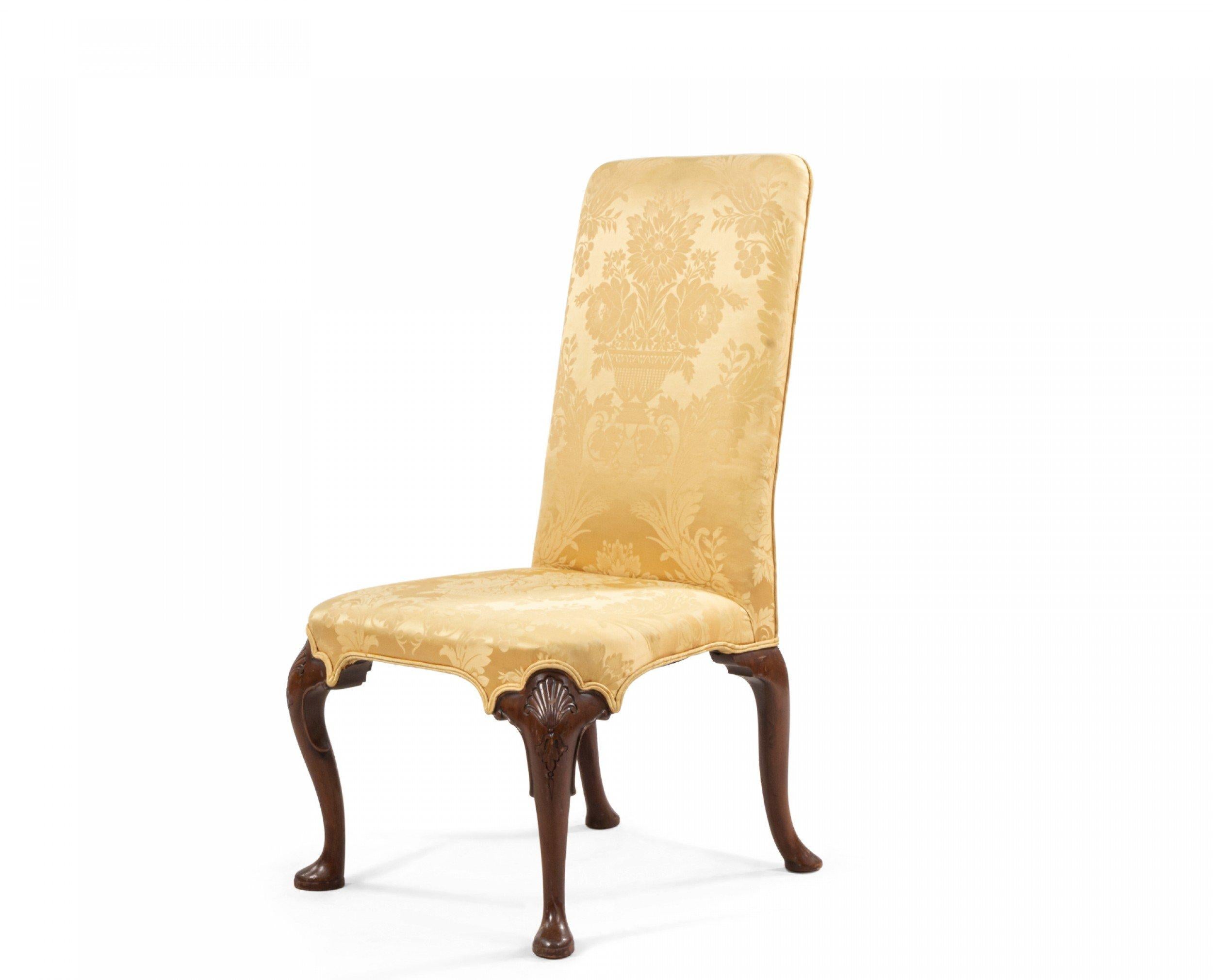 Pair of 20th century English Queen Anne style yellow damask upholstered side chairs with mahogany cabriole legs with carved shell design.