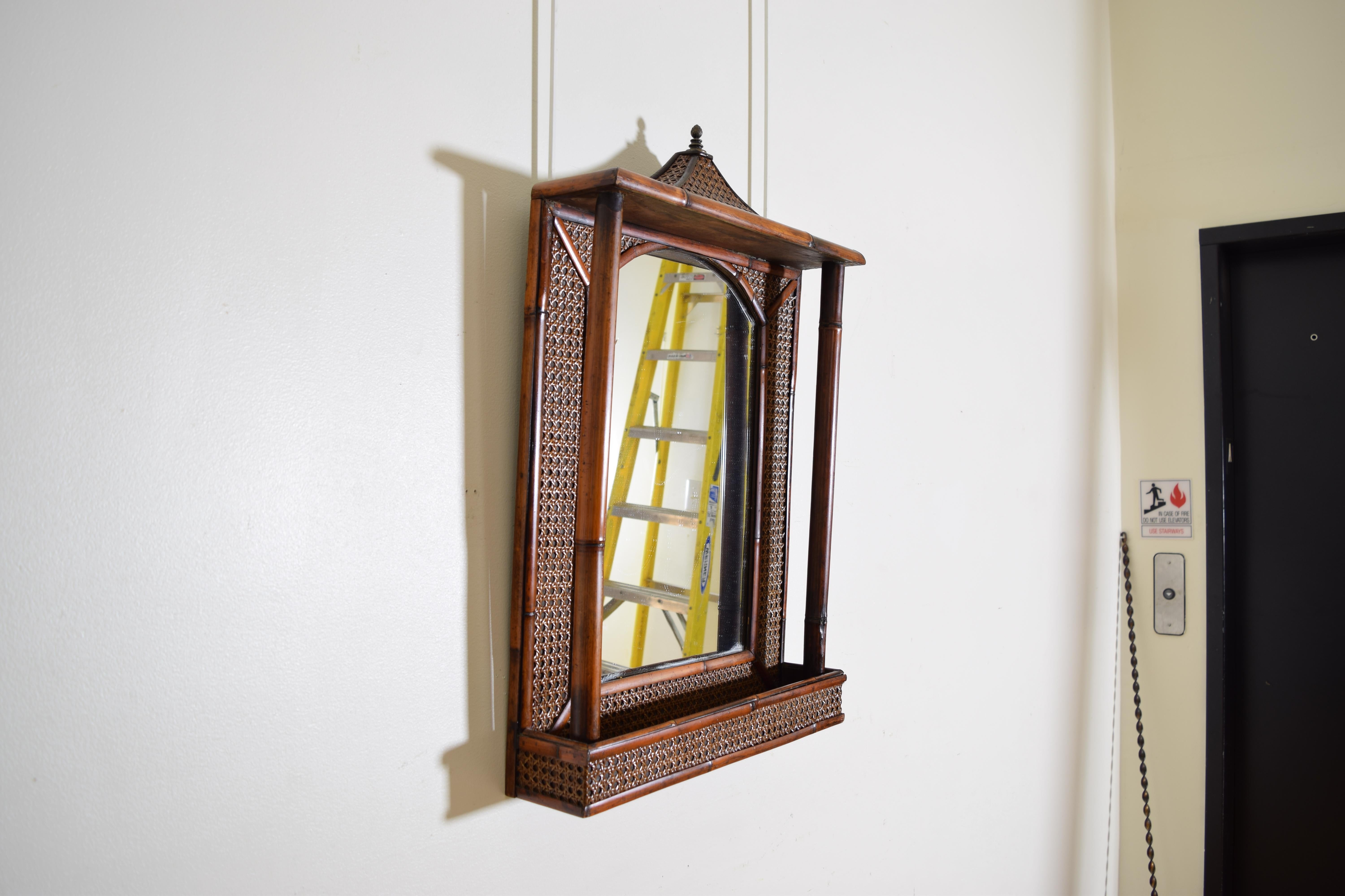 Chippendale English Rattan, Faux Bamboo, and Brass Pagoda Shaped Mirror with Storage Area