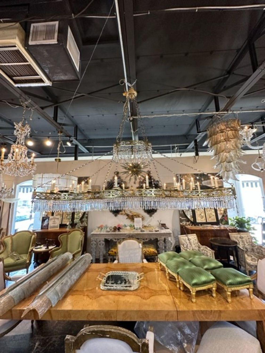 19th century English large scale bronze and crystal rectangular chandelier, circa 1880. The chandelier has been professionally rewired, comes with matching chain and canopy. It is ready to hang!