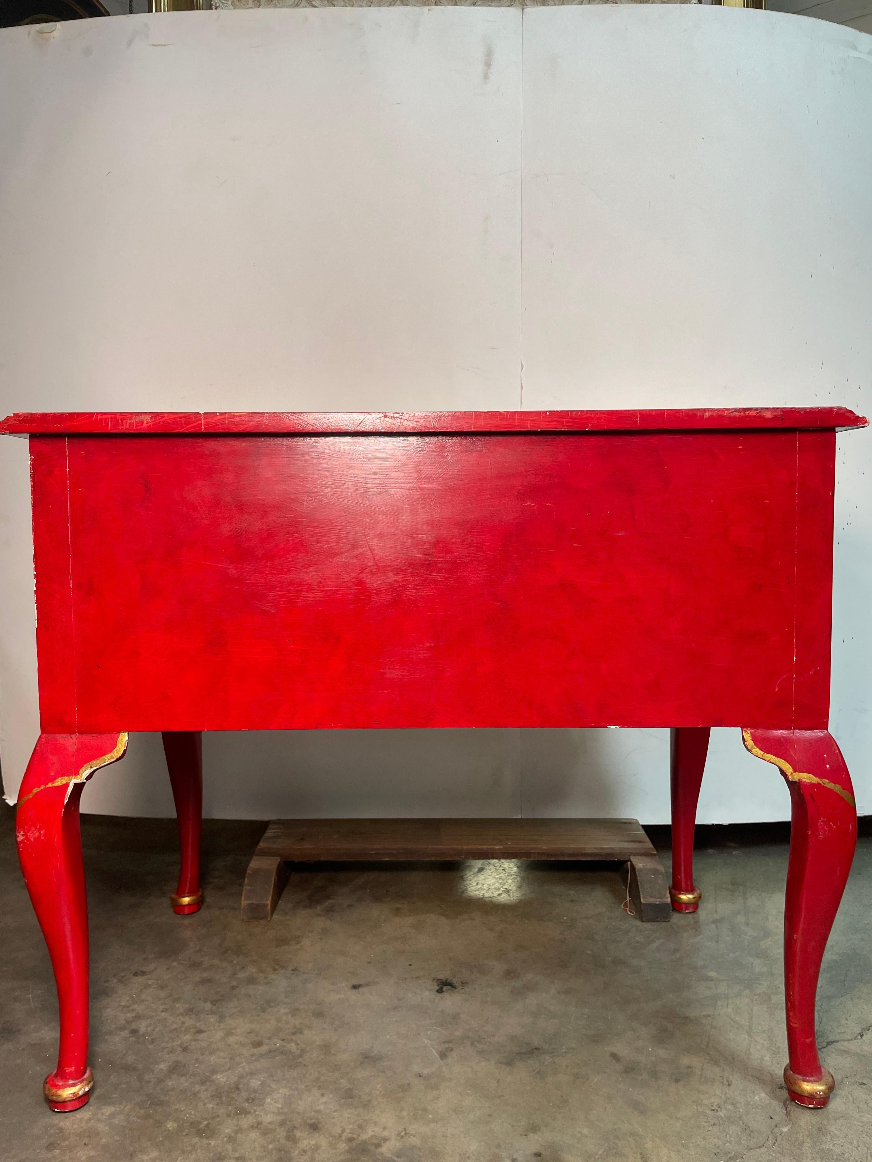 English Venezian Red Mini Kneehole Desk with raised Chinoiserie. Hand painted and crafted by Kipper himself in our shop; truly making this vibrant desk a one of a kind. He was inspired by the traditional Asian chinoiserie, and wanted to create his