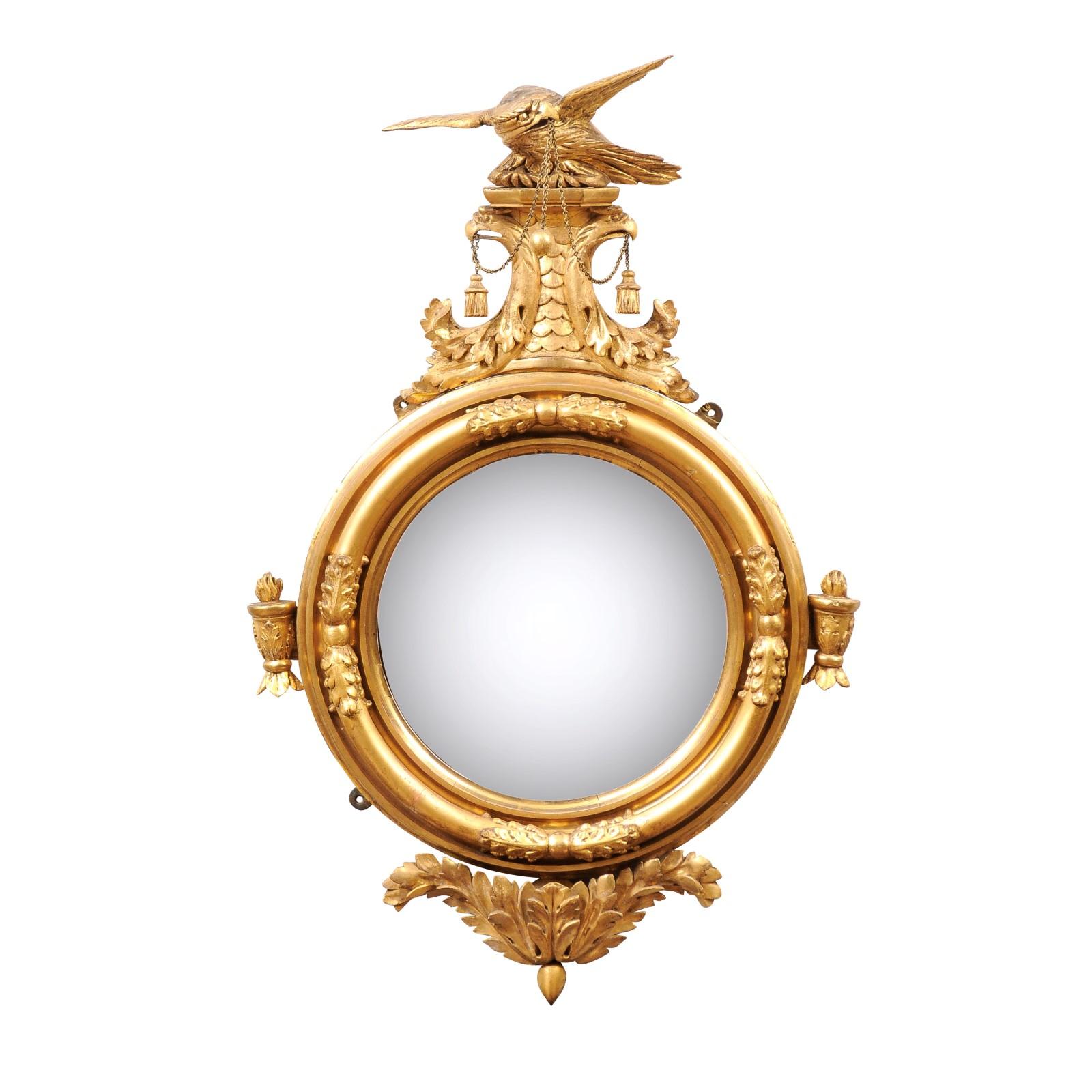 English Regency 19th Century Bull’s Eye Mirror with Eagle Crest and carved Acanthus Leaf Detail