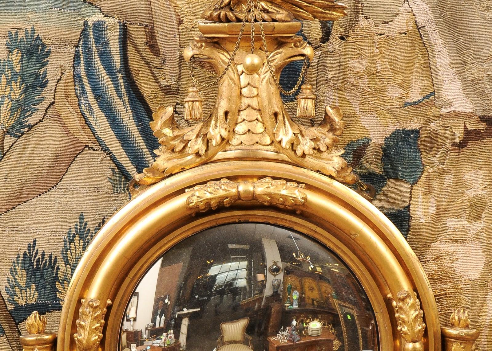 English Regency 19th Century Bull’s Eye Mirror with Eagle Crest  In Good Condition For Sale In Atlanta, GA