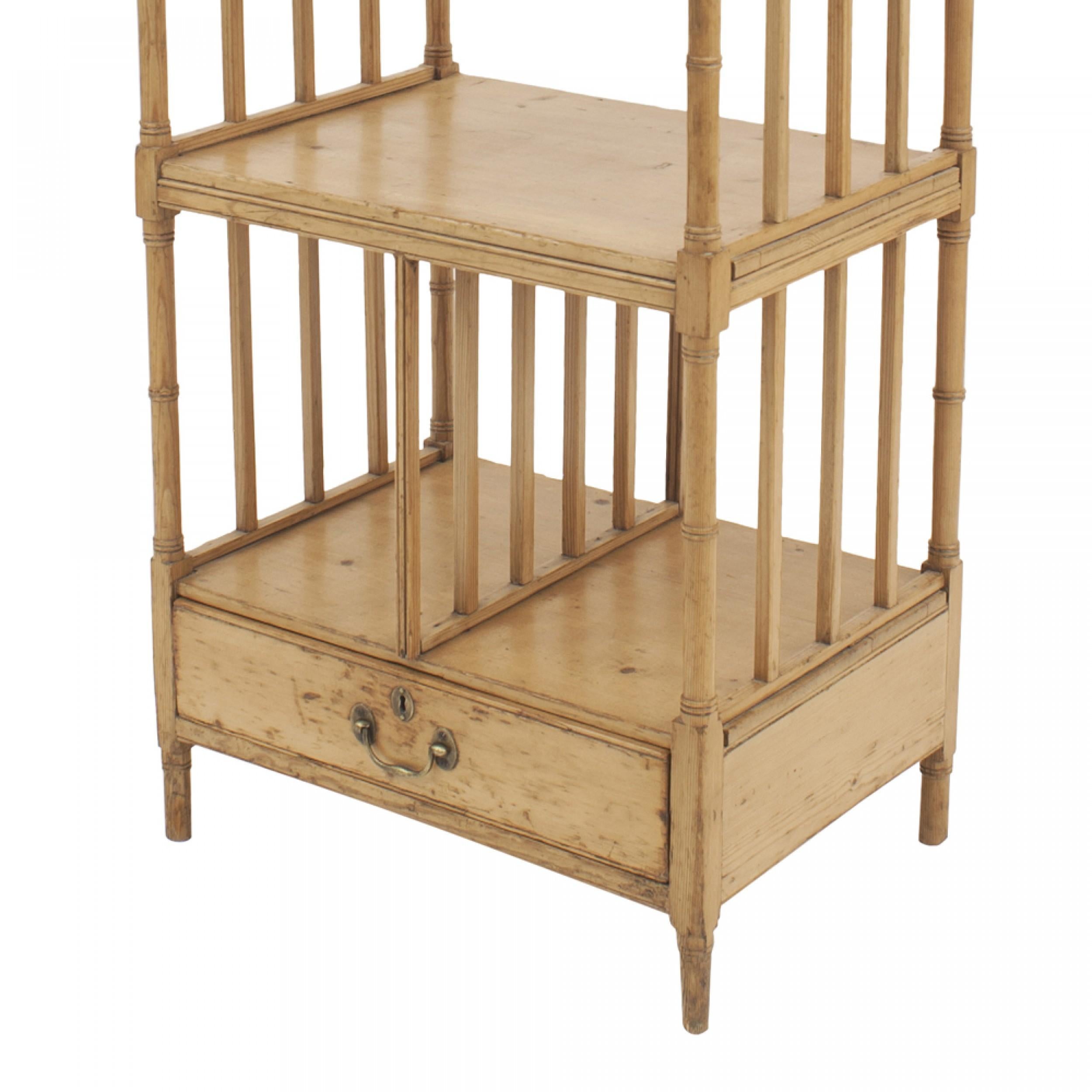 English Regency (19th century) narrow pine faux bamboo trimmed étagère / what-not with three open shelves and slat sides having a bottom drawer.
 