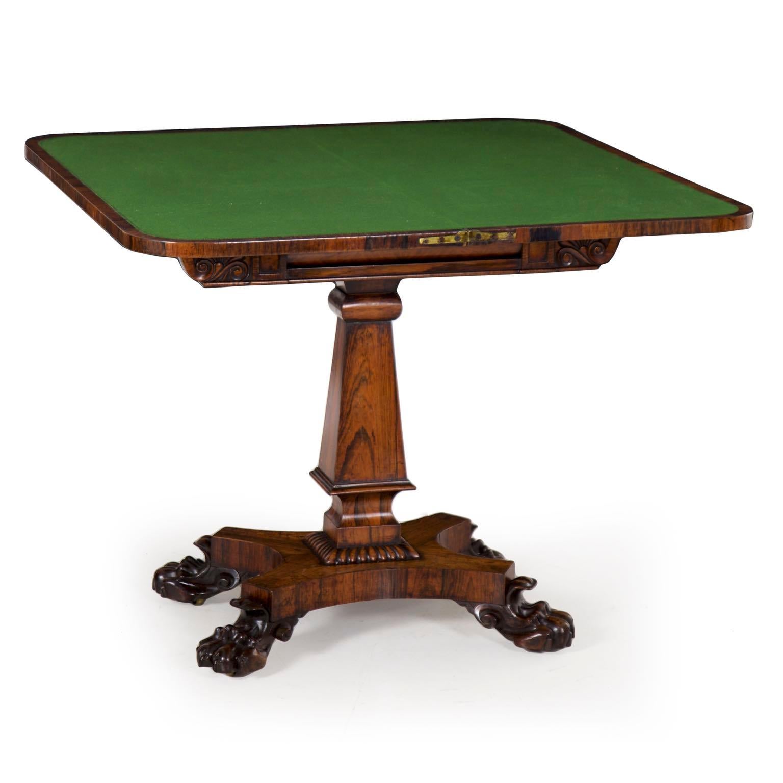 An exceptional and unusual card playing table from the second quarter of the 19th century, this very fine presentation piece is dressed in beautifully patinated rosewood veneers throughout. The chaotic grain is full of drama and movement, this